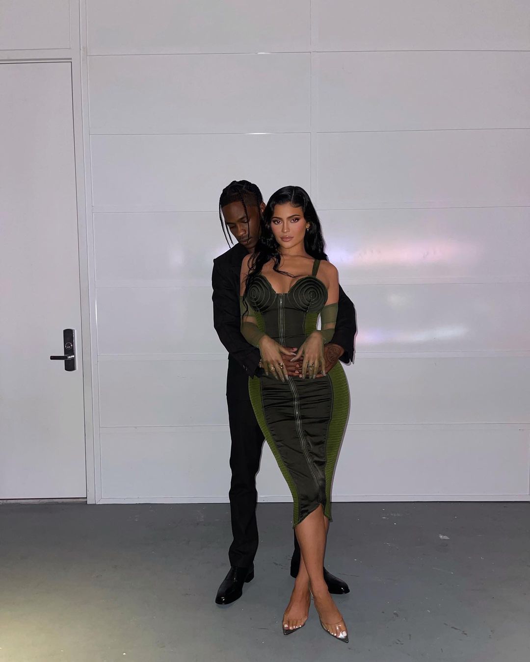 Travis Scott and Kylie Jenner post for cosy photo on Instagram.