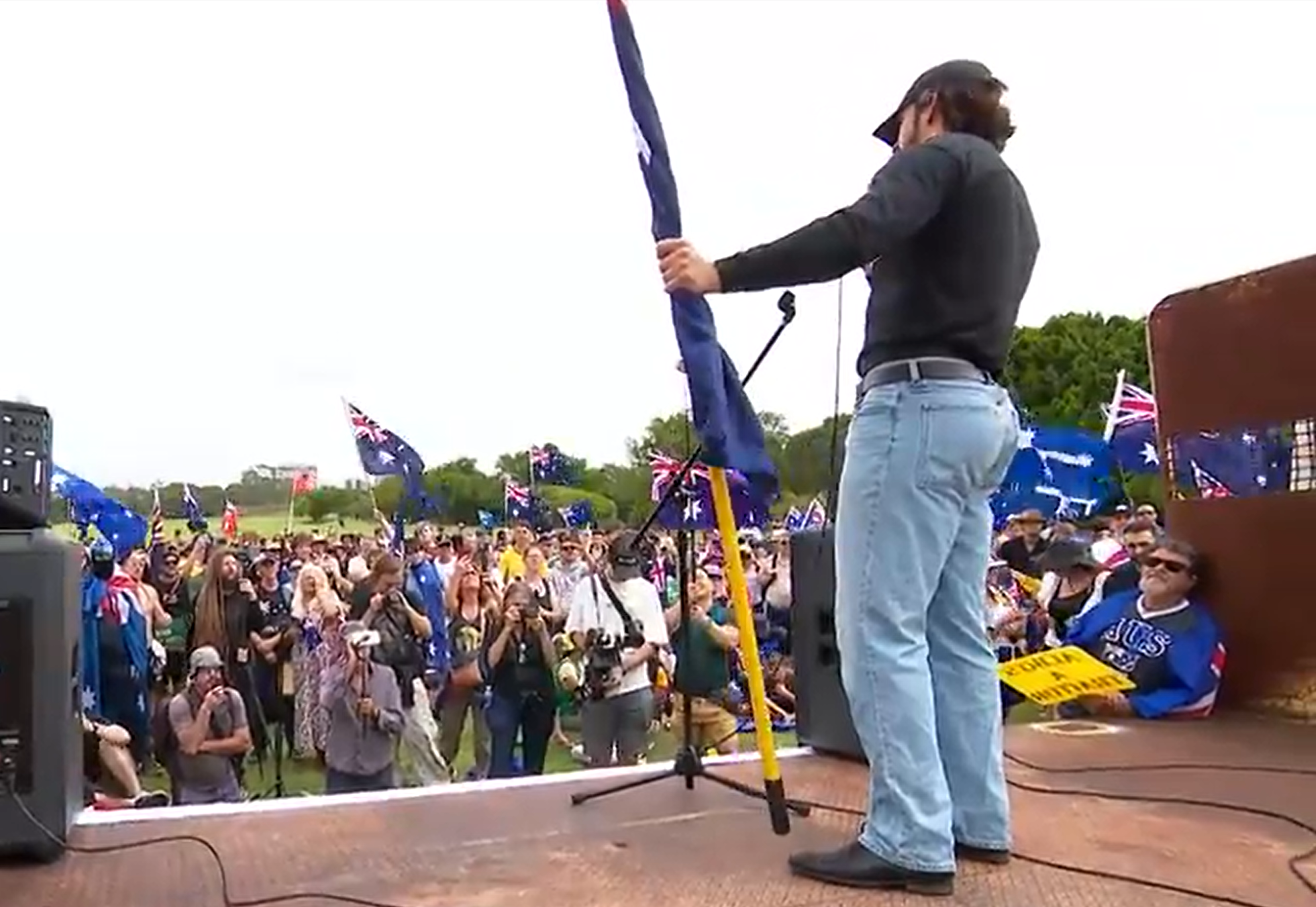 Brandan Koschel, 31, is accused of breaching newly passed racial hatred incitement laws in remarks to thousands of attendees of the anti-immigration March for Australia rally in Sydney yesterday.