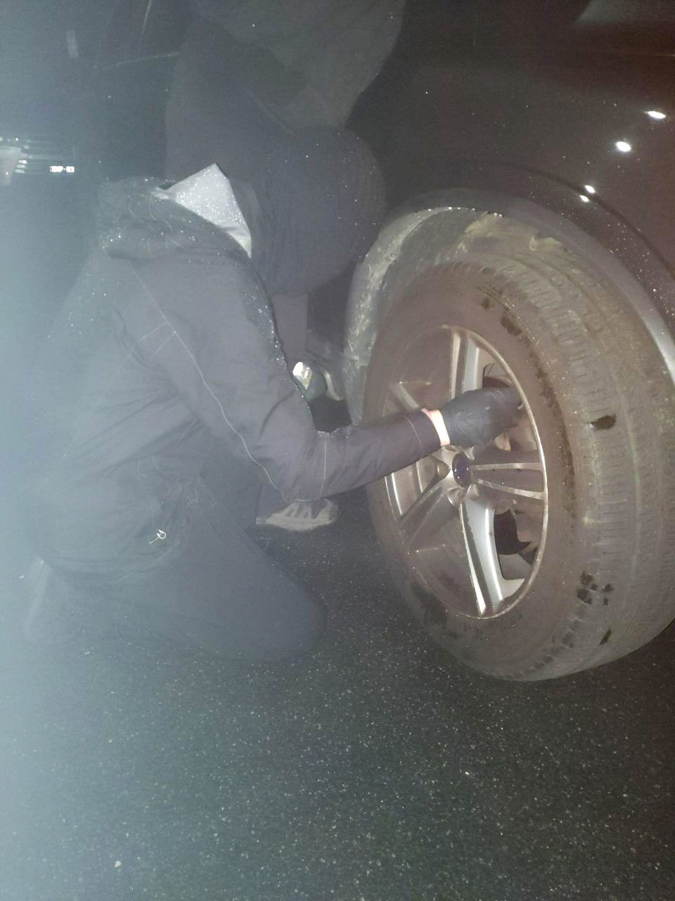 A member with Tyre Extinguishers lets down a tyre in Melbourne. 