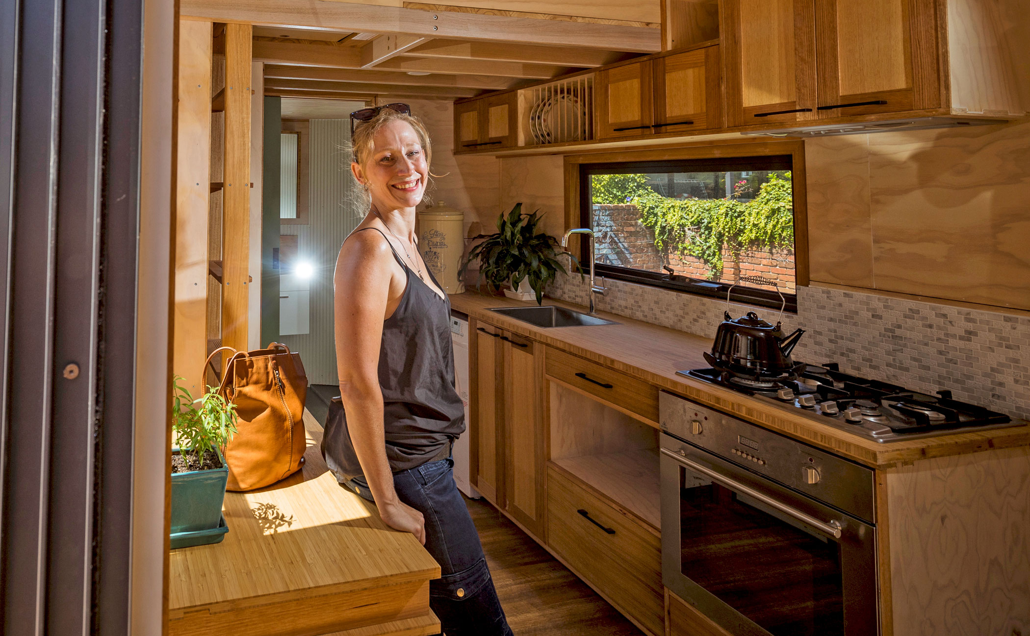 Elle Paton, pictured inside her St Kilda tiny home.