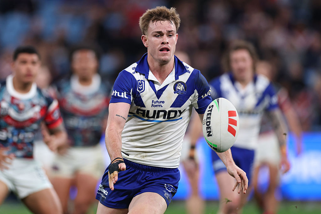 Lachlan Galvin of the Bulldogs passes the ball.