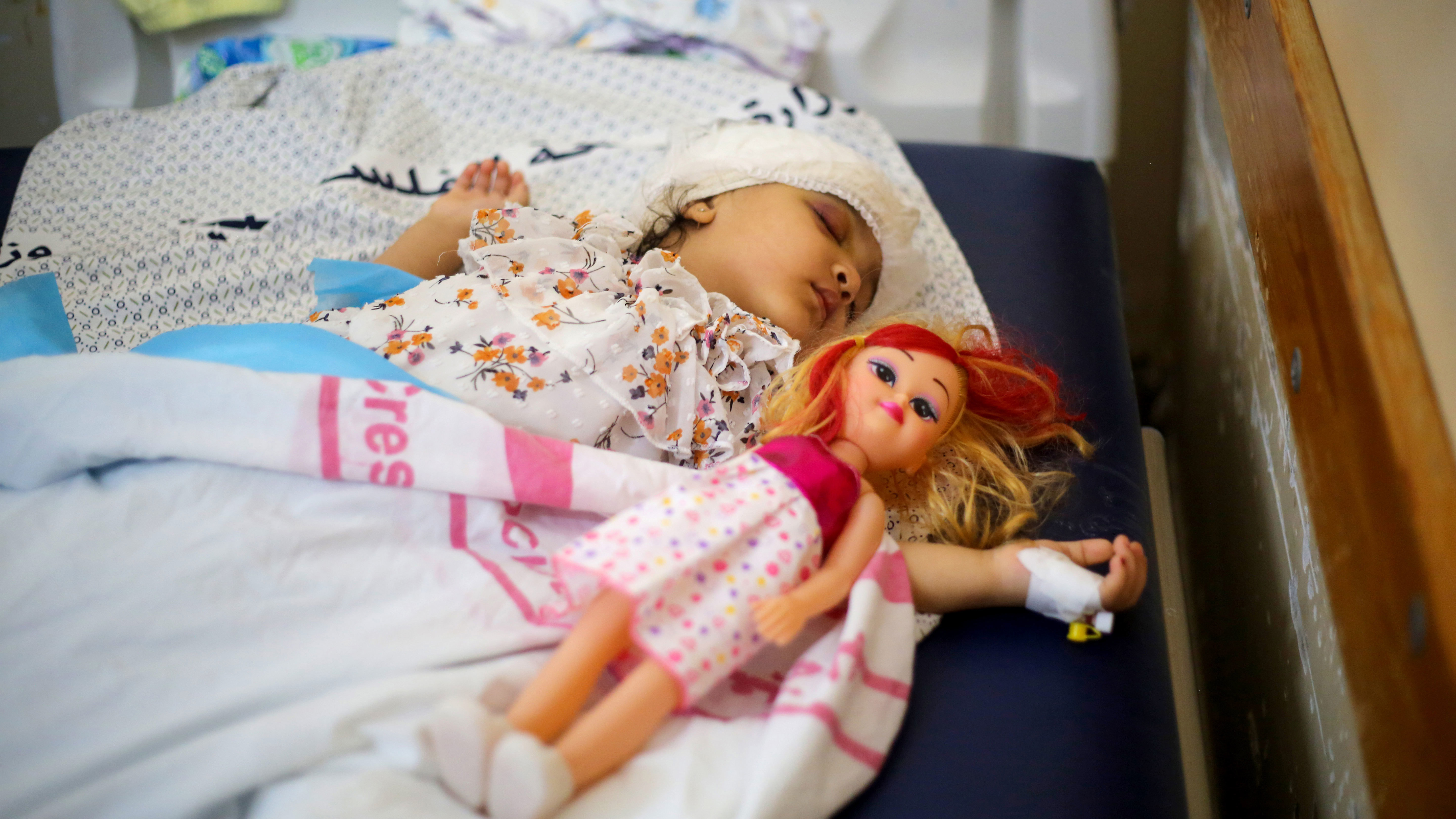 An injured Palestinian child is seen in an intensive care unit at Nasser Hospital on October 15, 2023 in Khan Yunis, Gaza.