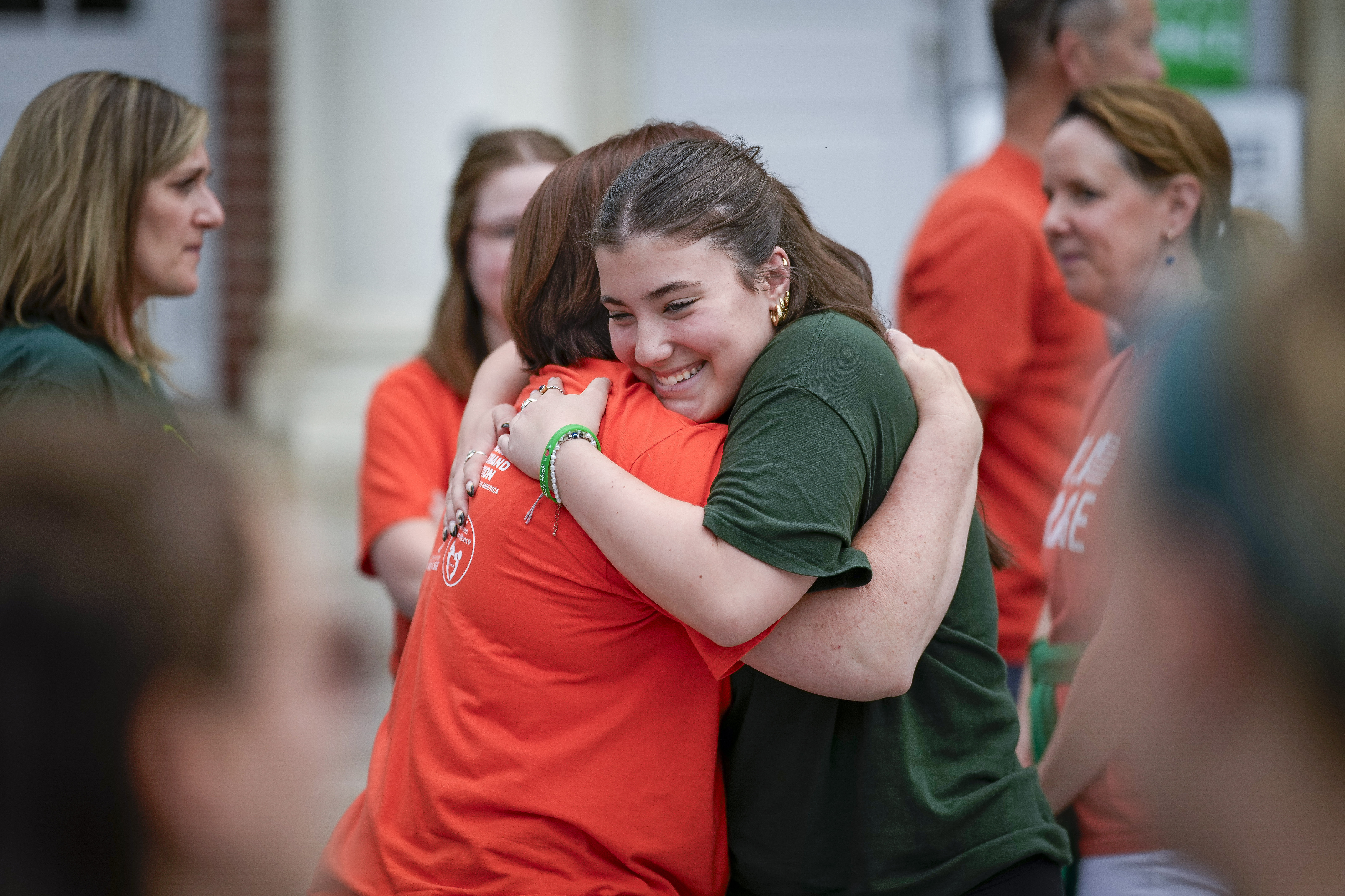 ‘They’ll be there with us’: Sandy Hook shooting survivors graduate