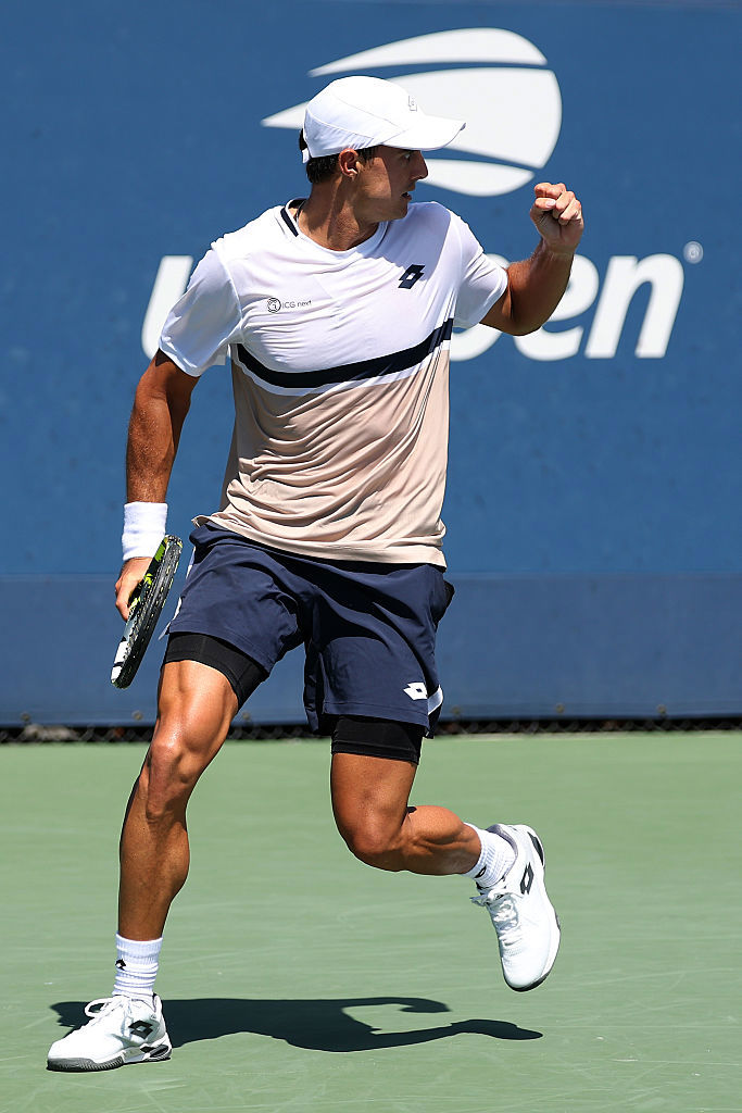 Adam Walton of Australia reacts after winning the second set against Ugo Humbert of France.
