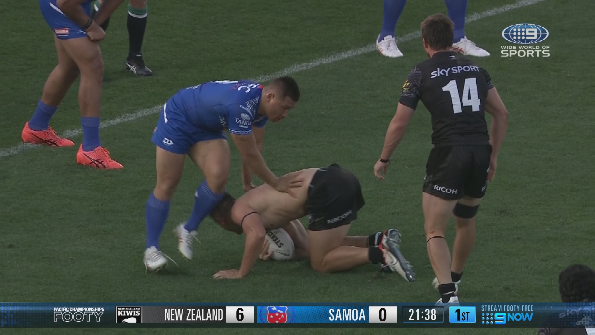 Joey Manu took a hit up while shirtless after it was ripped off in a previous tackle.
