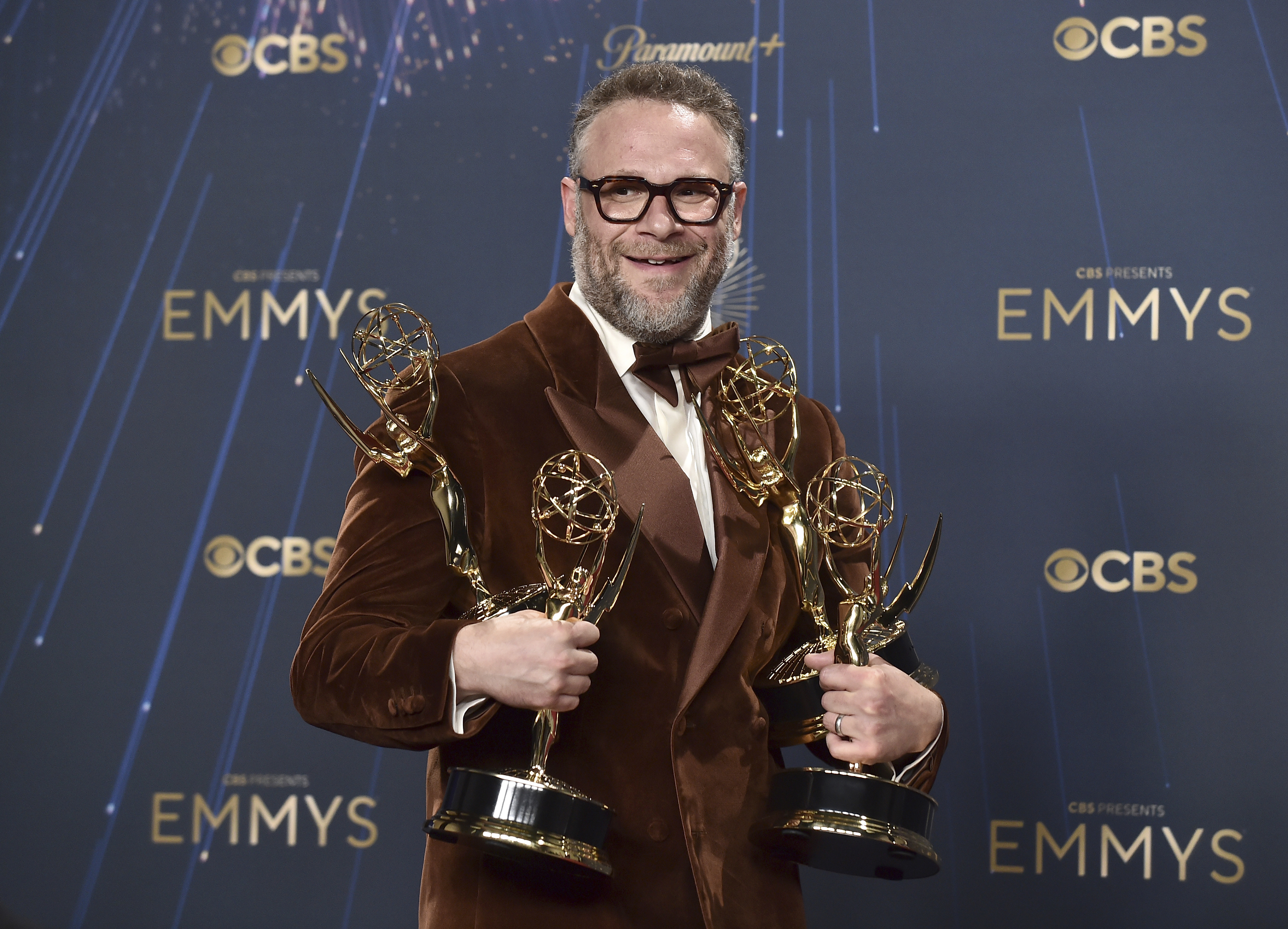 IMAGE DISTRIBUTED FOR THE TELEVISION ACADEMY - Seth Rogen poses in the press room with his Emmys at the 77th Emmy Awards on Sunday, Sept. 14, 2025 at the Peacock Theater in Los Angeles.  