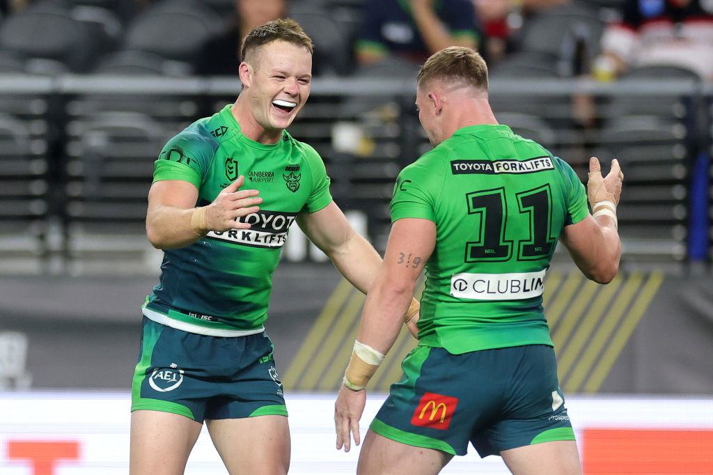 Ethan Strange and Hudson Young of the Raiders celebrate winning the round one NRL match between the Canberra Raiders and the New Zealand Warriors.