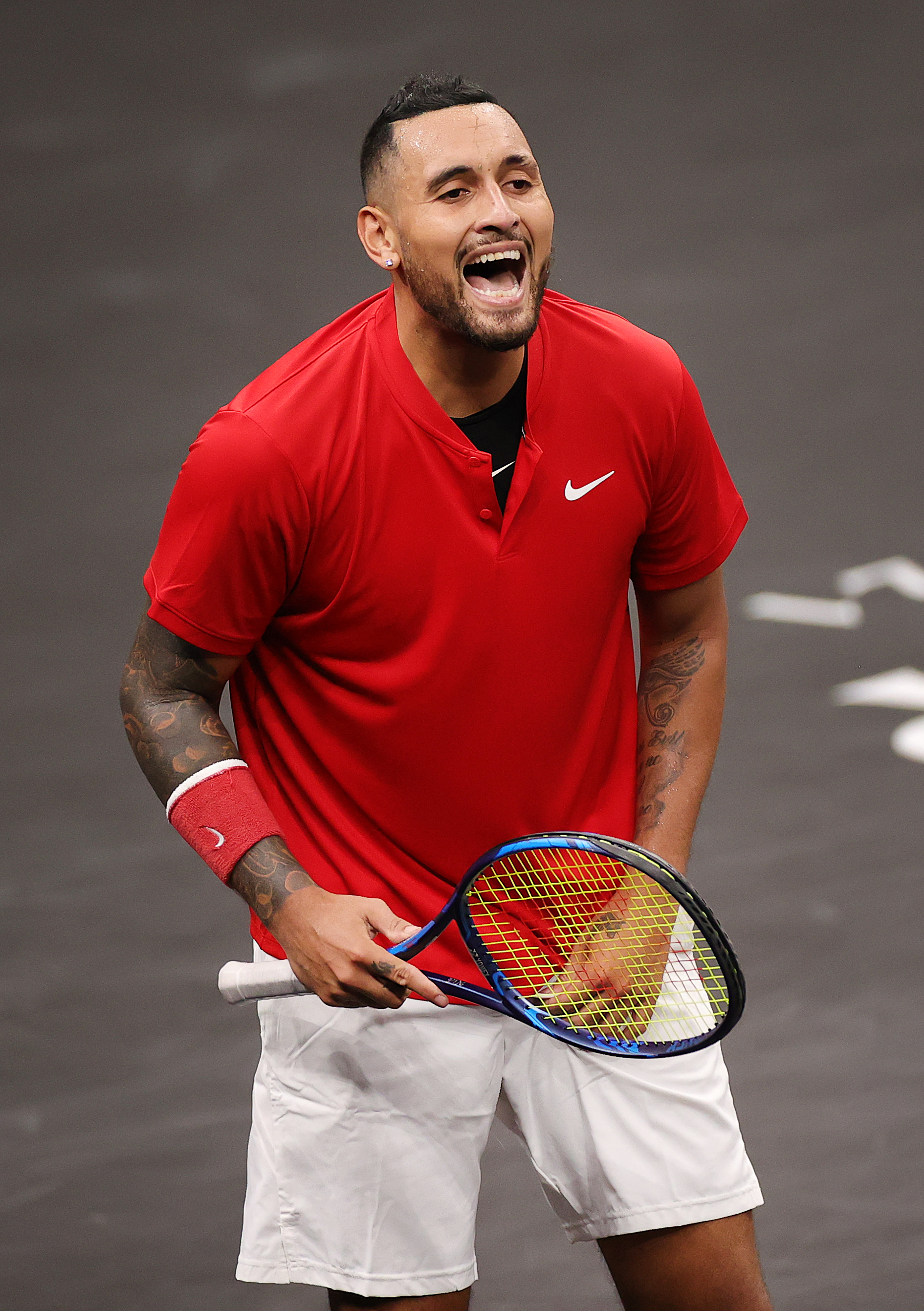 Nick Kyrgios of Team World reacts to a shot against Stefanos Tsitsipas of Team Europe during the fifth match during Day 2 of the 2021 Laver Cup at TD Garden.