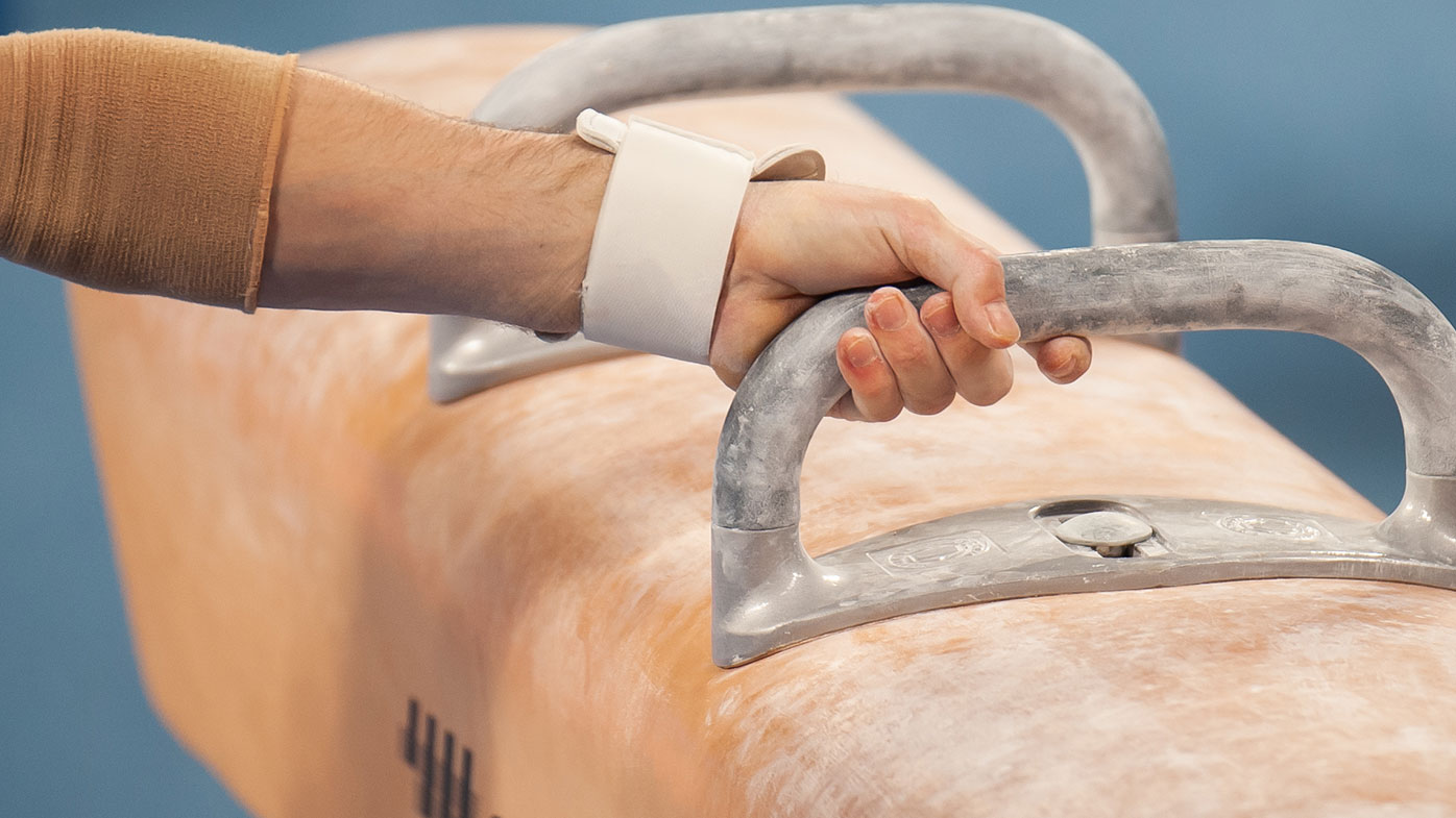 A gymnast grips the pommel horse prior during warm up at The World Cup Gymnastics on February 21, 2019 at Melbourne Arena, VIC. (Photo by Speed Media/Icon Sportswire via Getty Images)