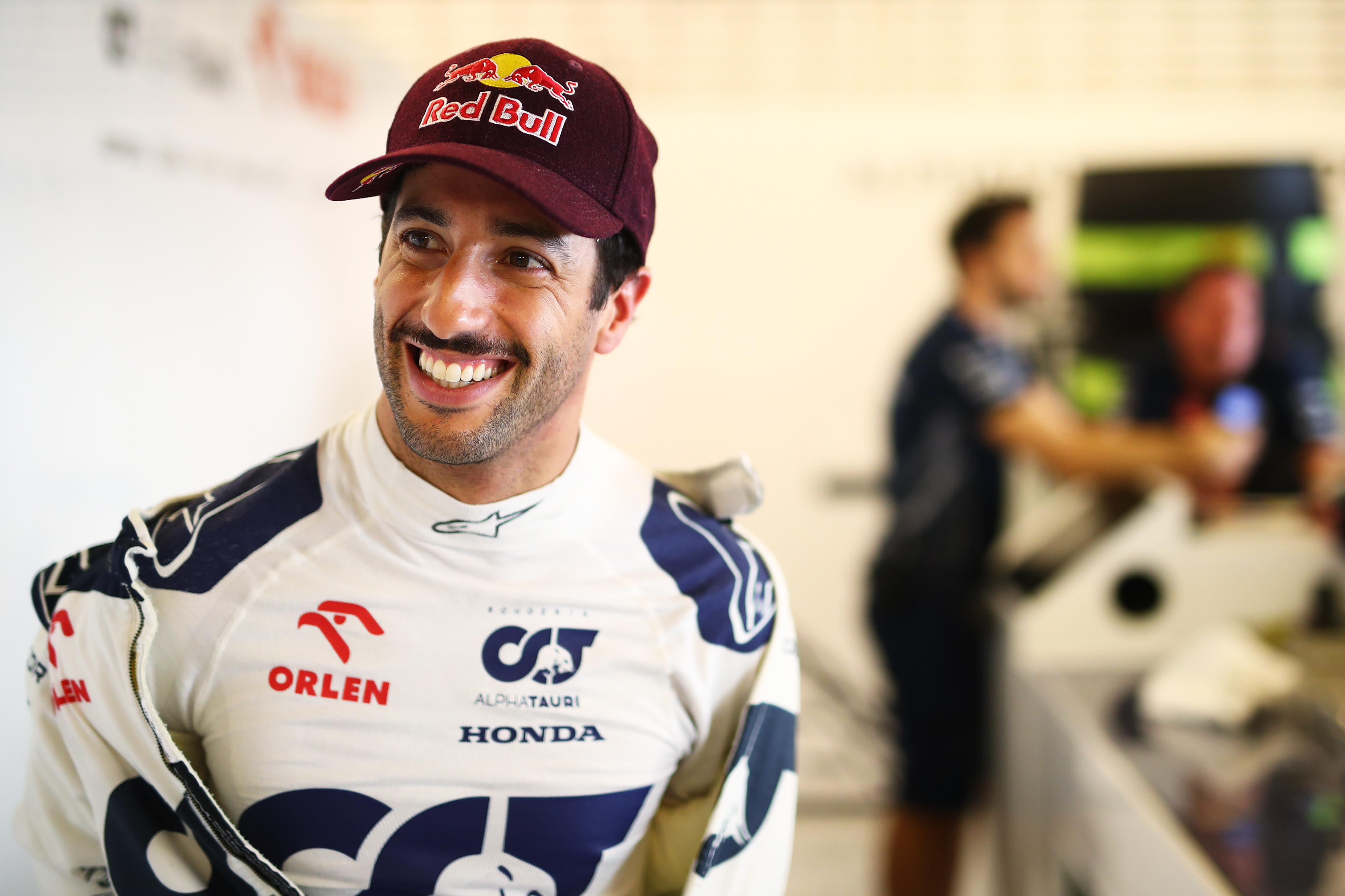 Daniel Ricciardo of Australia and Scuderia AlphaTauri prepares to drive in the garage during Formula 1 testing at Yas Marina Circuit on November 28, 2023 in Abu Dhabi, United Arab Emirates. (Photo by Joe Portlock/Getty Images)