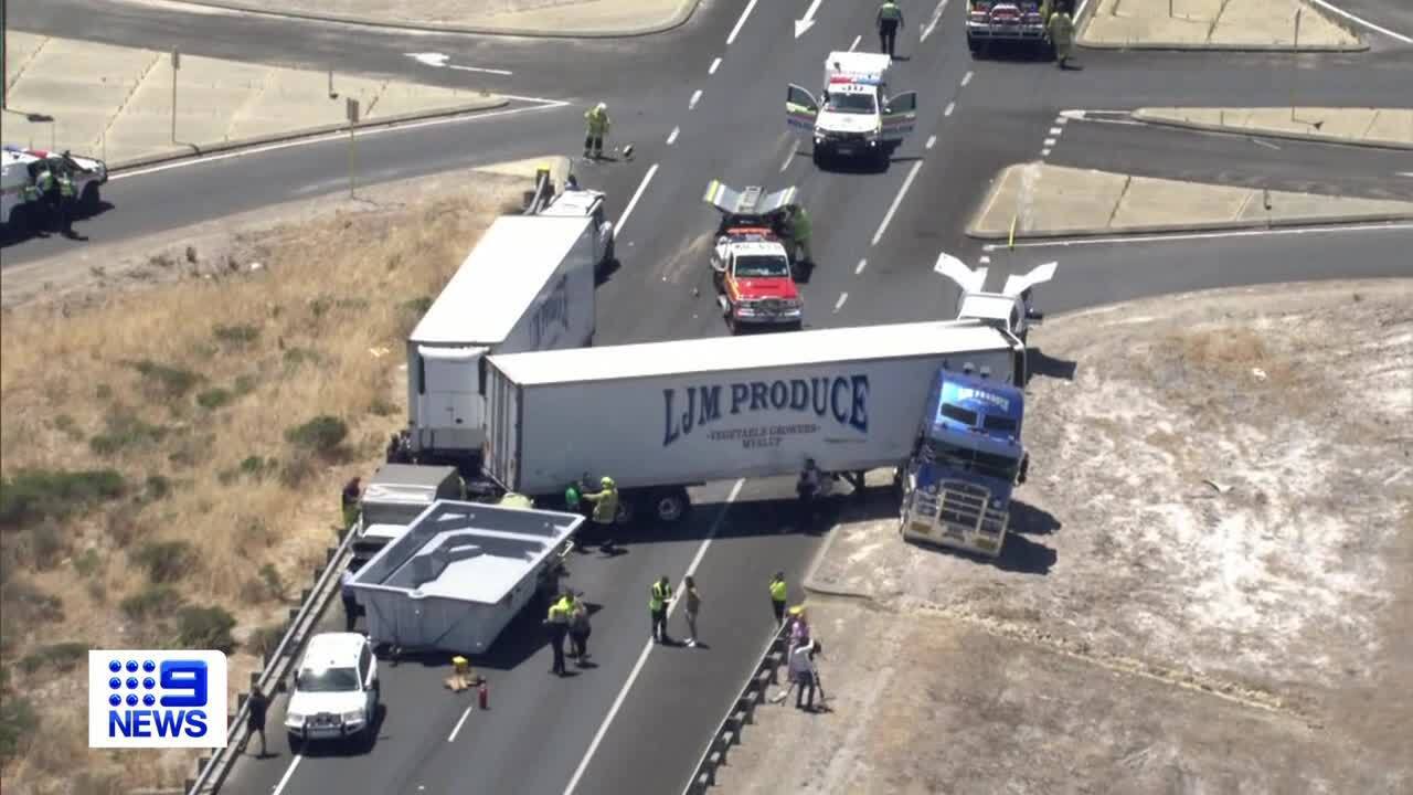 A road train has jackknifed and caused a pool to smash into a car's windscreen on a highway south of Perth.