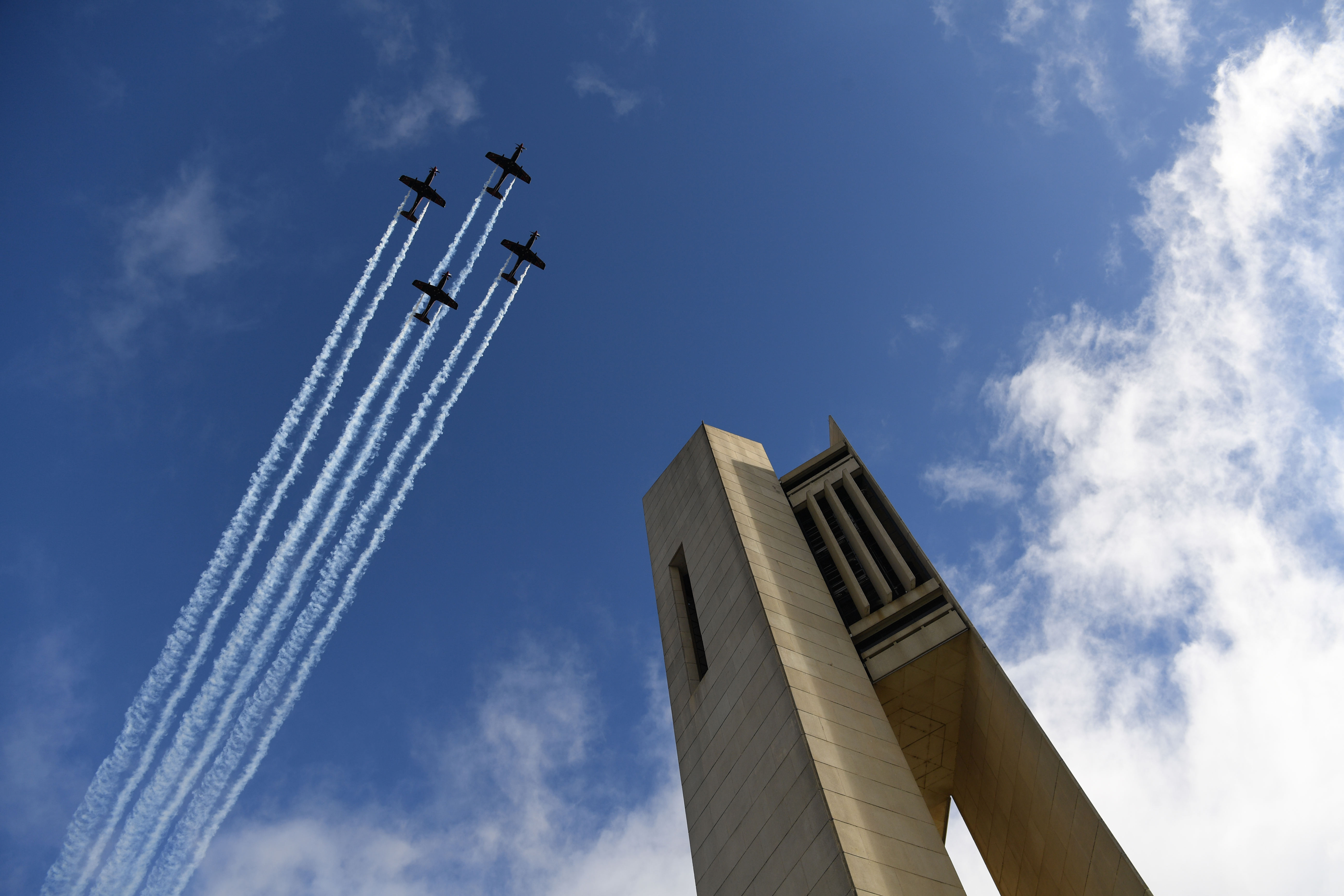CANBERRA, AUSTRALIA - JUNE 04: A Royal Australian Airforce flypast in front of the Carillon during the renaming ofAspen Island in honour of Queen Elizabeth II as part of the Queen's Platinum Jubilee Celebrations on June 04, 2022 in Canberra, Australia. The Australian Government has renamed Aspen Island on Lake Burley Griffin to Queen Elizabeth II Island, in Her Majesty's honour to as part of The Queen's Platinum Jubilee celebrations marking 70 years of the Queen's dedication and service to Austr