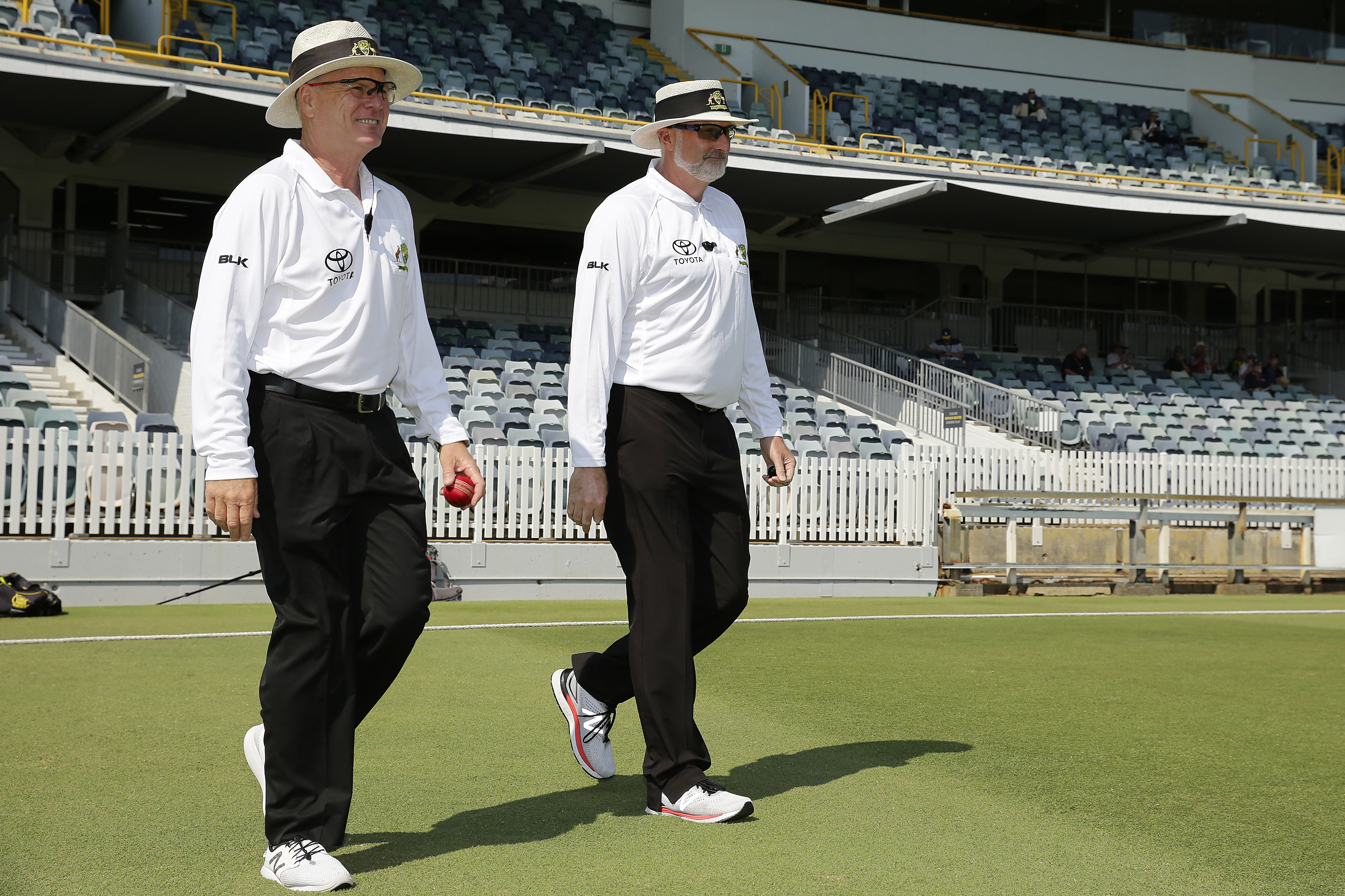Match umpires Bruce Oxenford and Paul Wilson walk onto the field of play during day two of the Sheffield Shield match between Western Australia and Victoria at WACA on March 26, 2021 in Perth, Australia. (Photo by Will Russell/Getty Images)