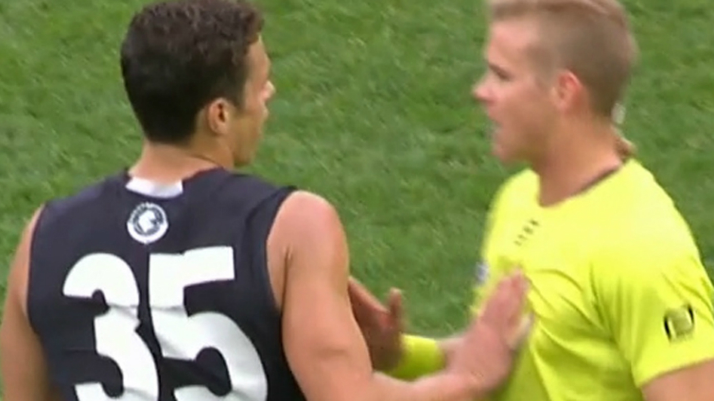 Ed Curnow touches umpire