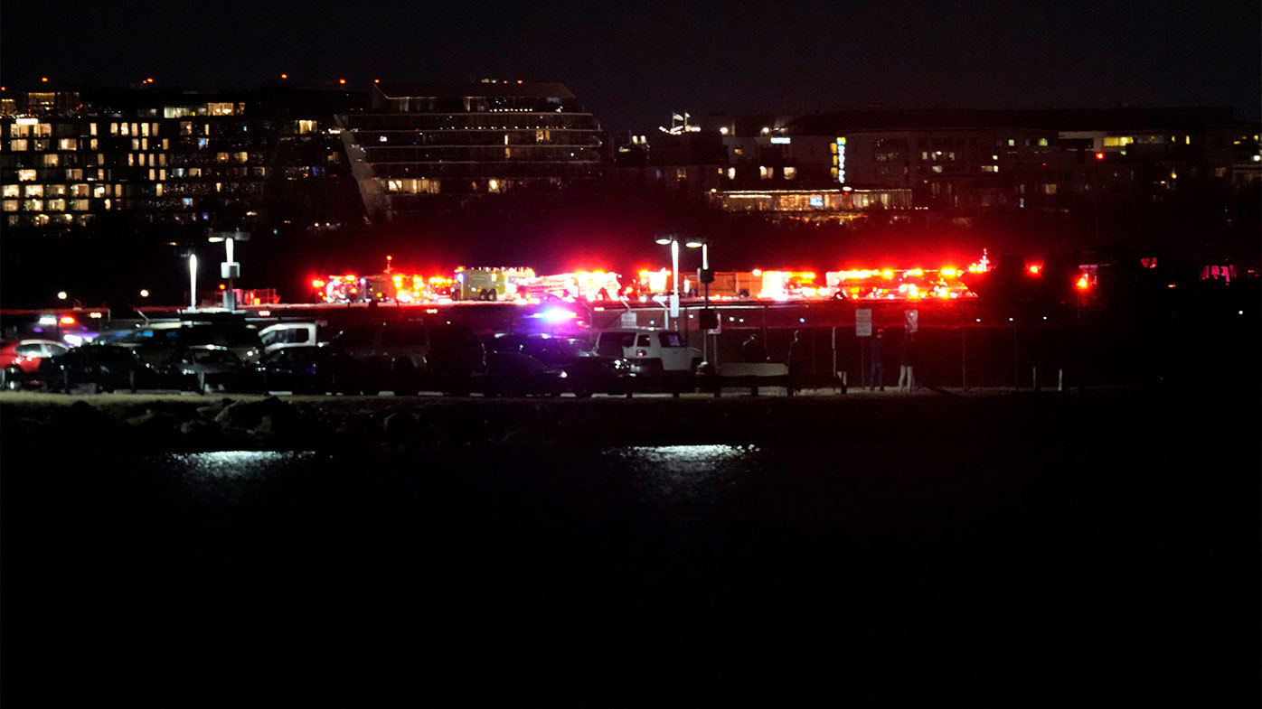 Emergency vehicles gathering near the site of the crash in Washington DC.