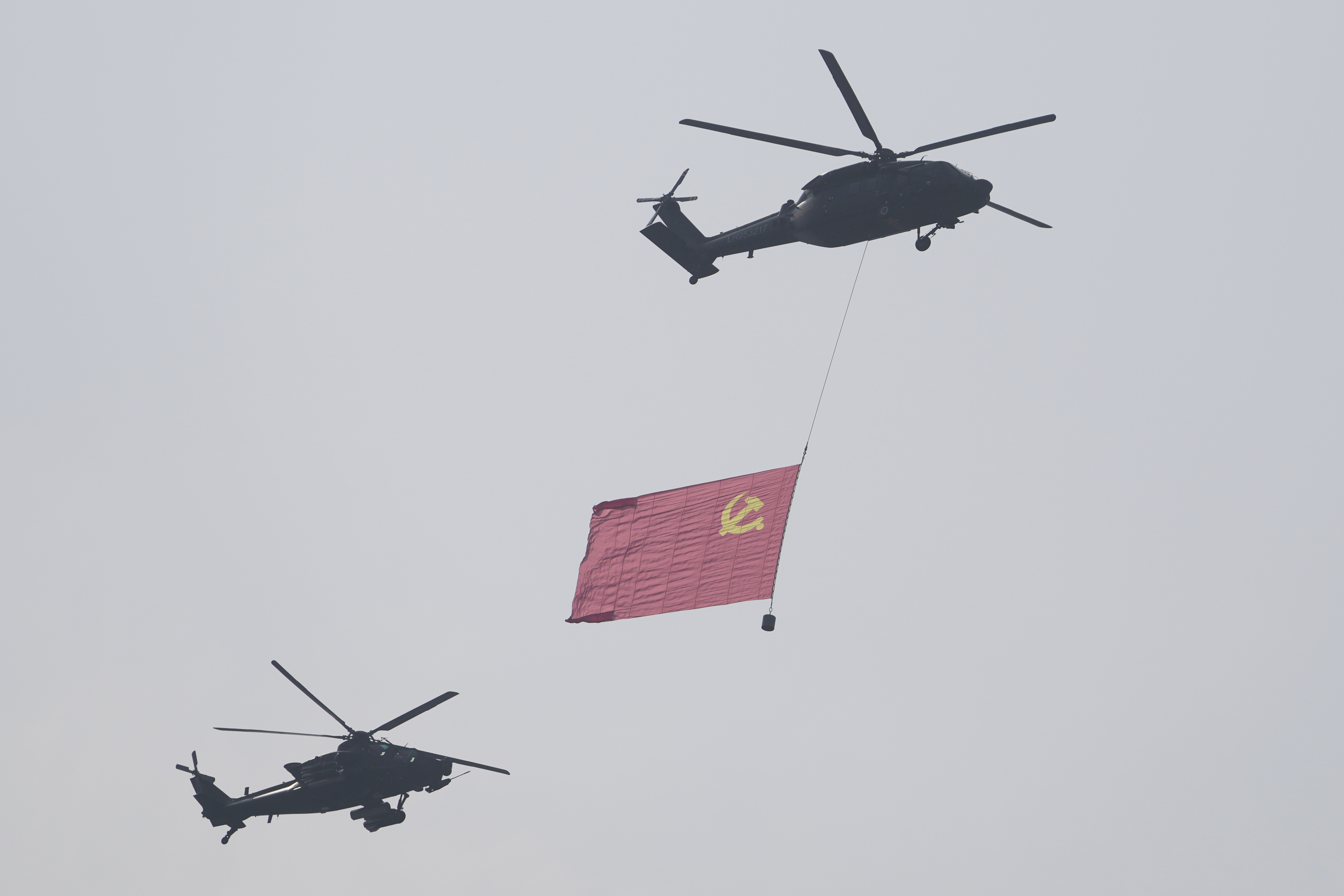 Helicopters take part in a military parade to commemorate the 80th anniversary of Japan's World War II surrender held in front of Tiananmen Gate in Beijing.