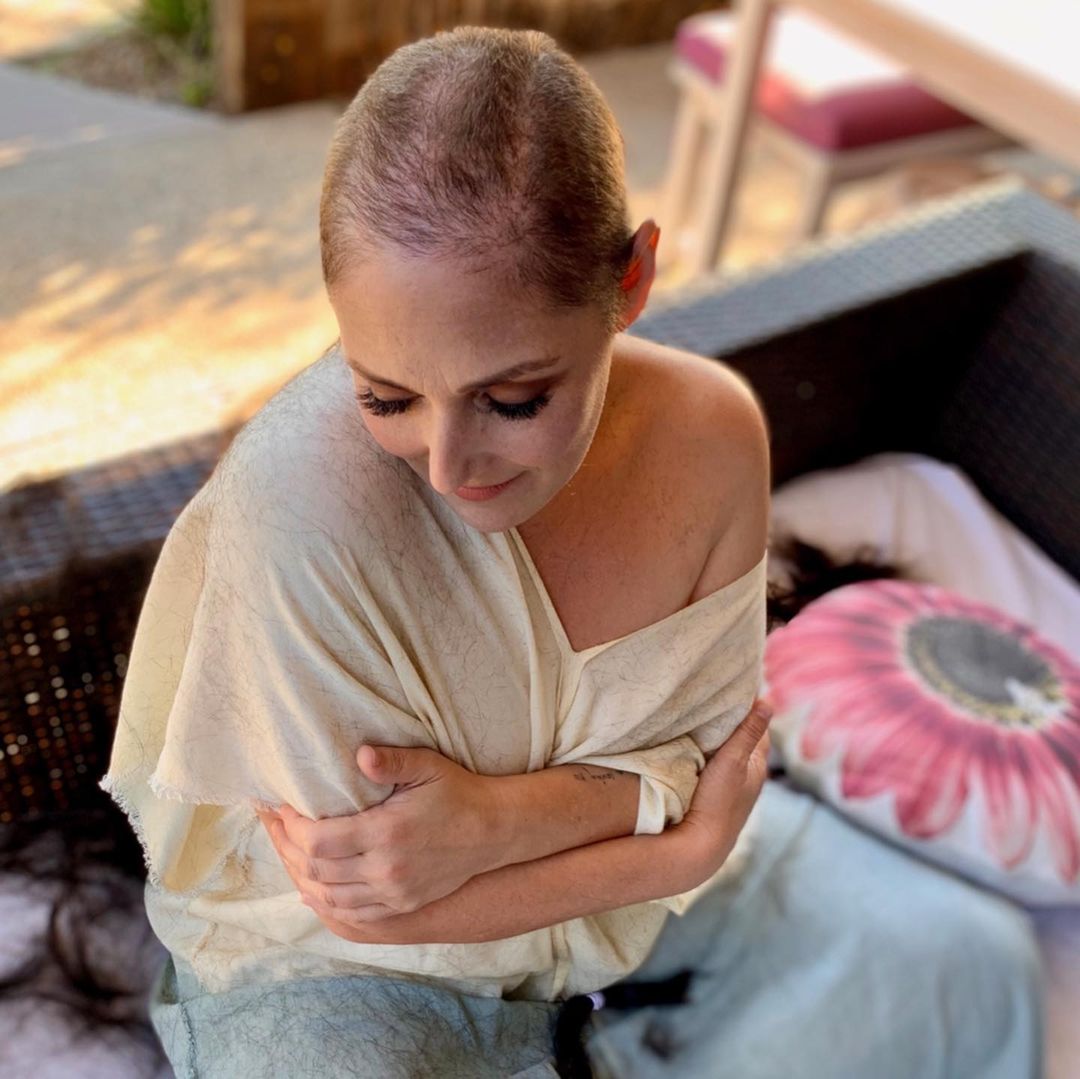 Former TV host and actress Ricki Lake shaves her head in 2019, revealing lifelong alopecia battle.