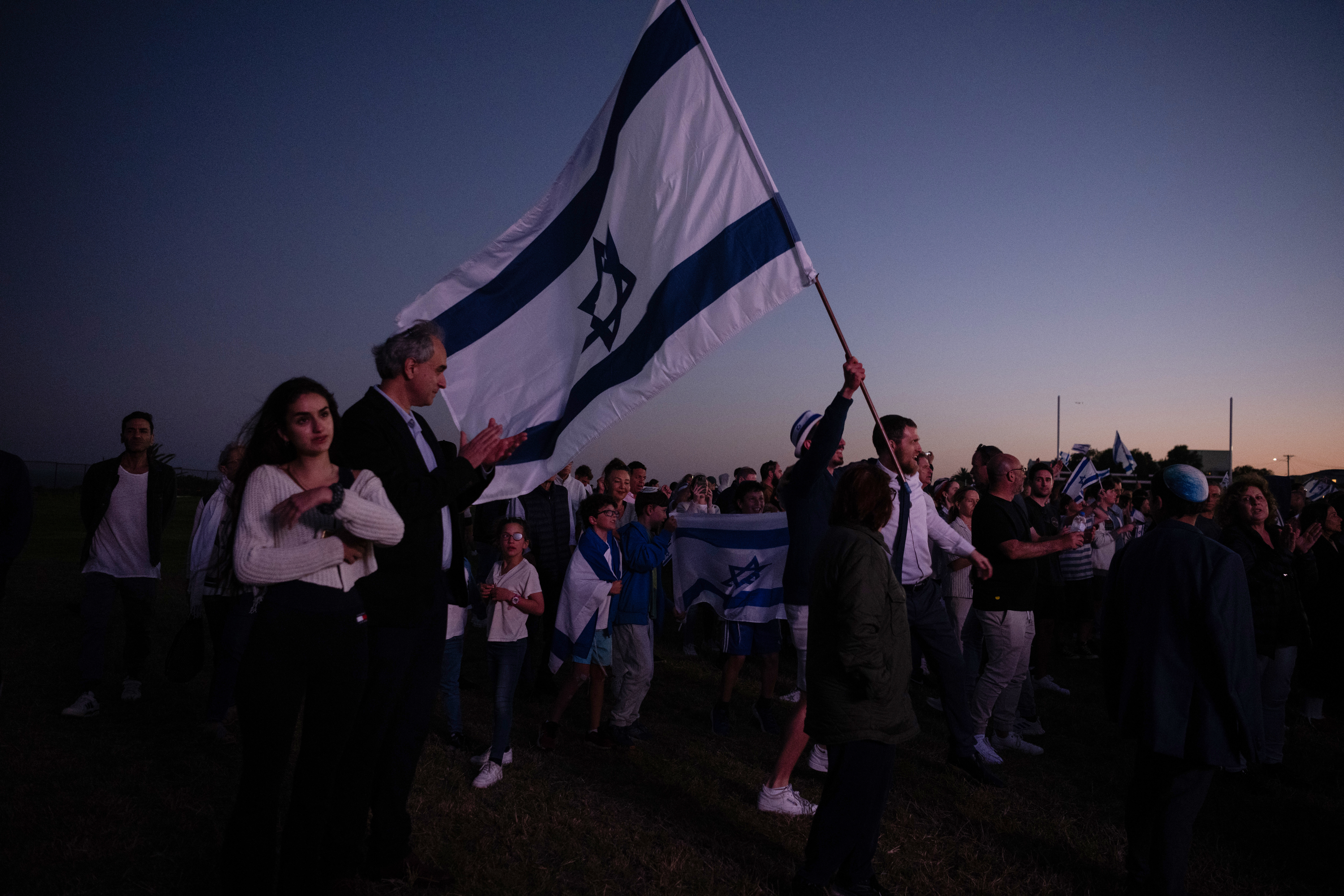 People gather for a Jewish vigil in Support of Israel at Rodney Reserve in Dover Heights on October 11, 2023.