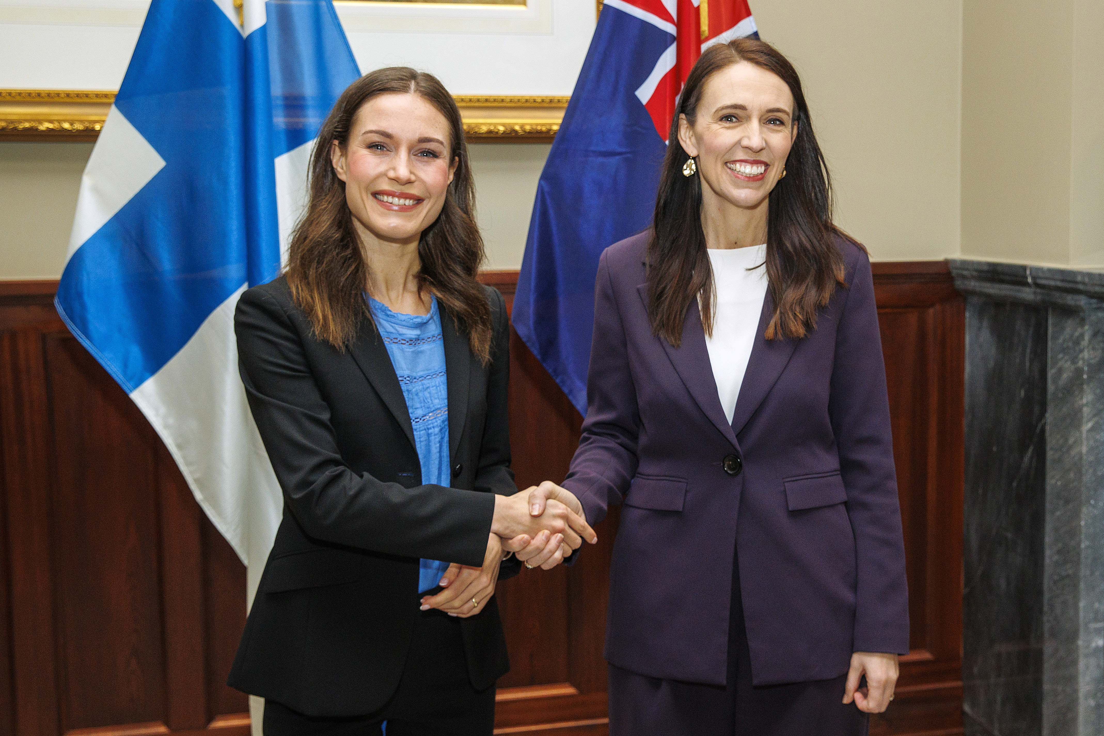 Finnish Prime Minister Sanna Marin (left) and New Zealand Prime Minster Jacinda Ardern (right) pose for a portrait at Government House on November 30, 2022 in Auckland, New Zealand.