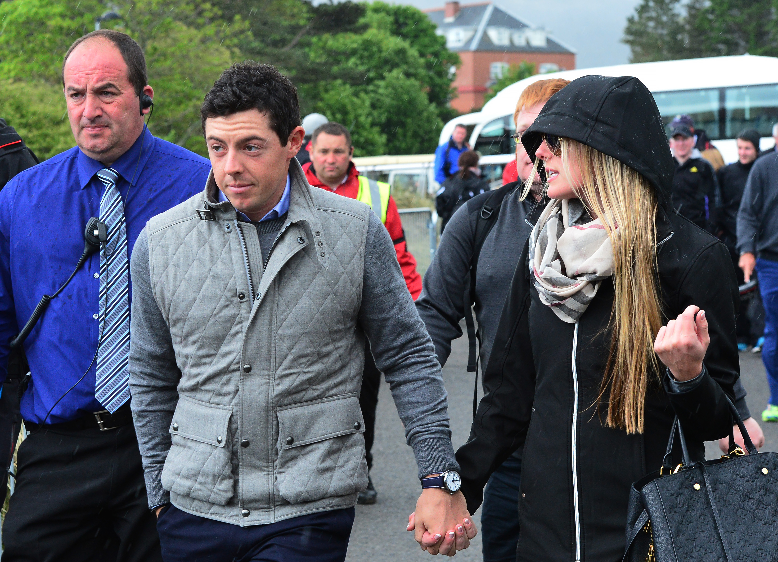 Rory McIlroy of Northern Ireland arrives at the course with new girlfriend Erica Stoll during the fourth round of the Dubai Duty Free Irish Open, 2015