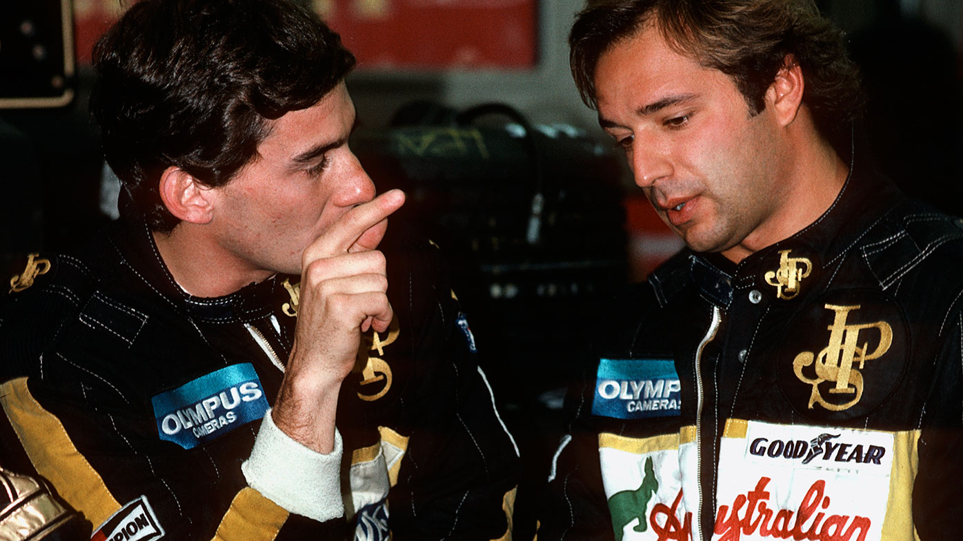 Elio de Angelis (right) with his Lotus teammate Ayrton Senna in 1985.
