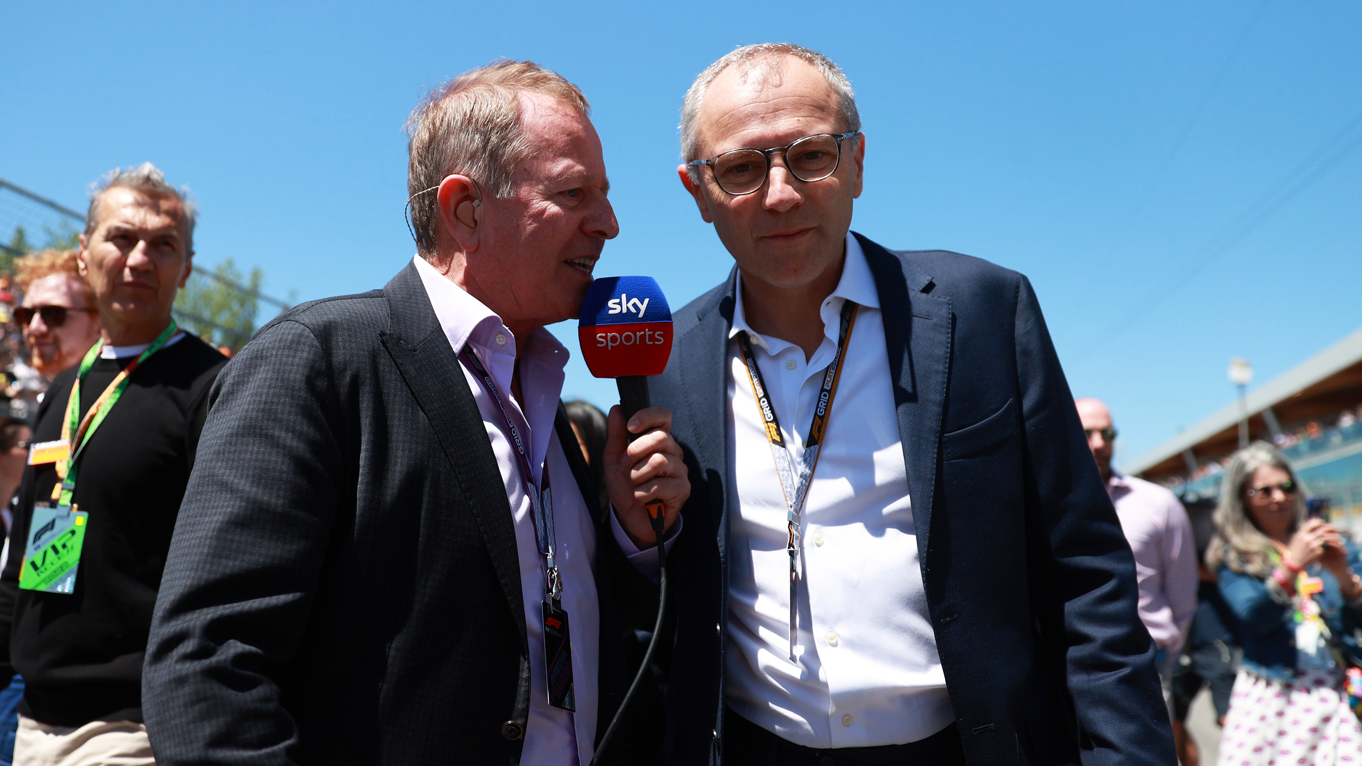 Martin Brundle (left) speaks with Formula 1 boss Stefano Domenicali.