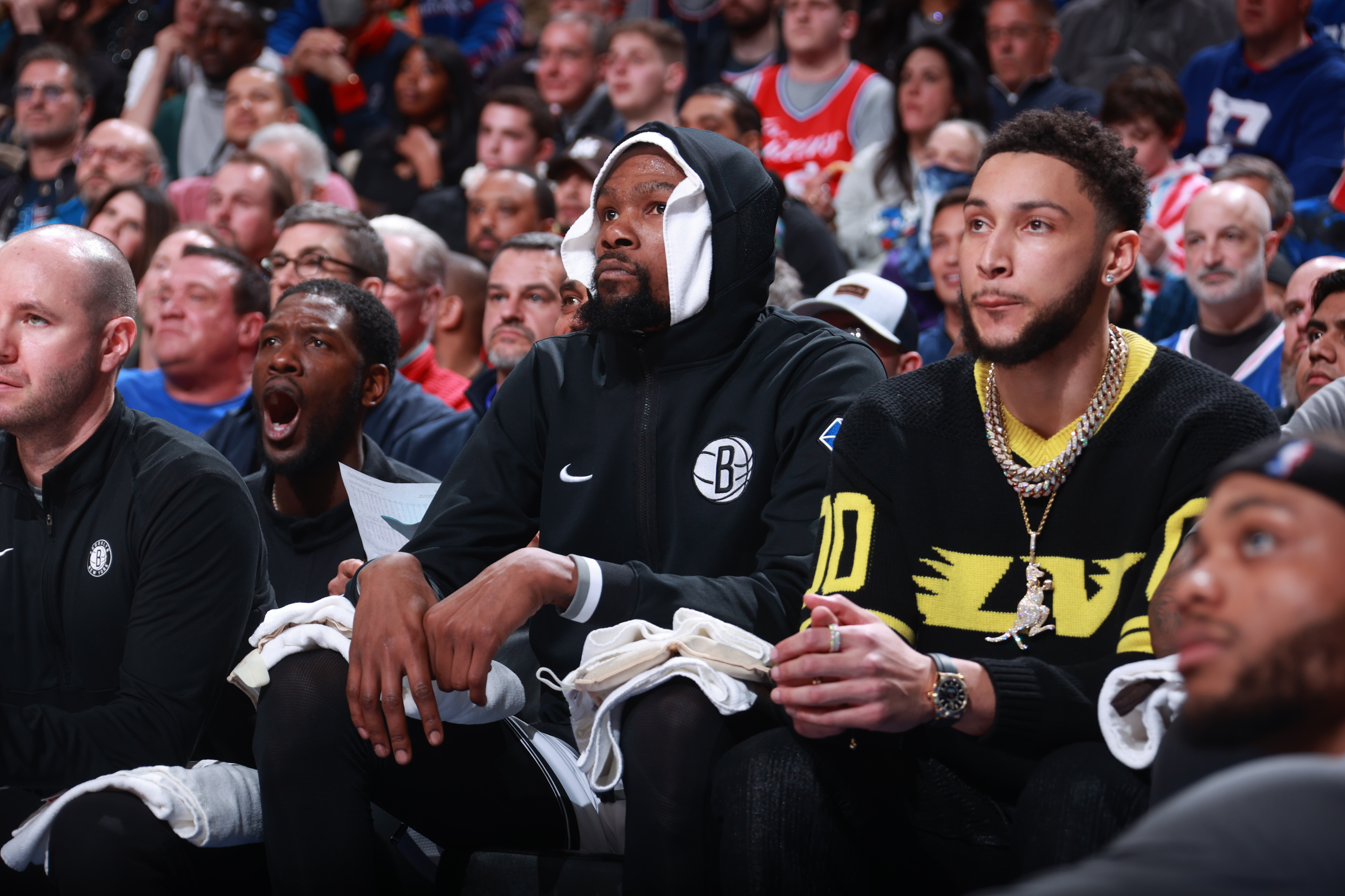 Kevin Durant and Ben Simmons of the Brooklyn Nets look on from the bench during the game against the Philadelphia 76ers.