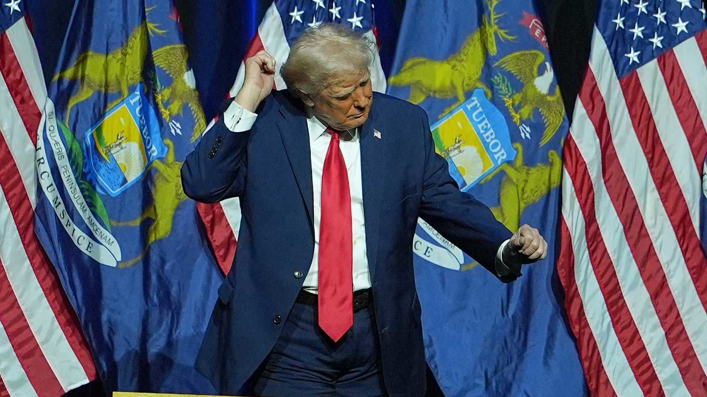 Donald Trump dancing at the Detroit Economic Club.
