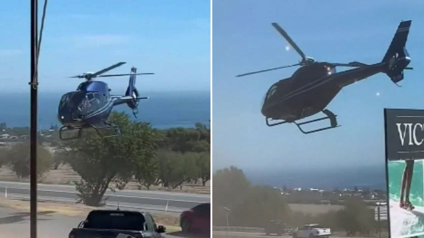 Helicopter hovers over Porsche outside Victory Hotel in Sellicks Hill, south of Adelaide.