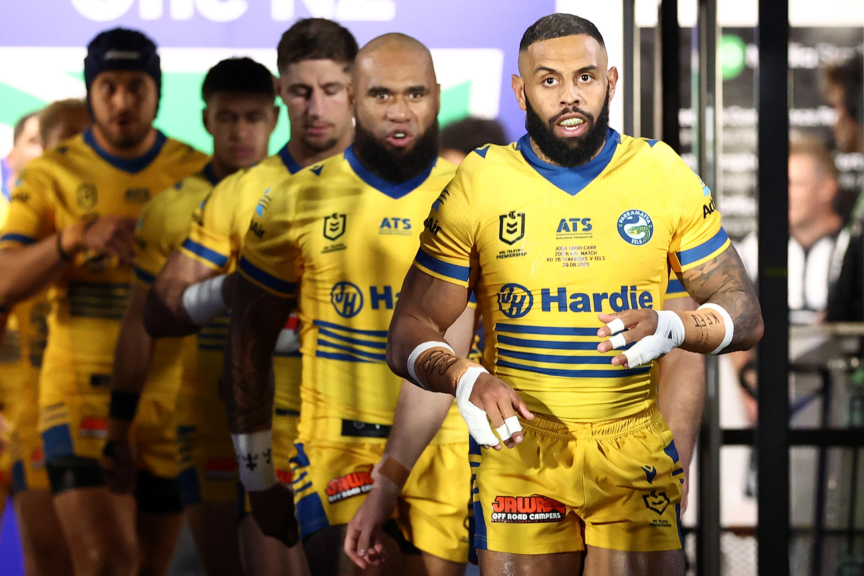 AUCKLAND, NEW ZEALAND - AUGUST 29: Josh Addo-Carr of the Eels runs onto the field for his 200th game during the round 26 NRL match between the New Zealand Warriors and Parramatta Eels at Go Media Stadium on August 29, 2025, in Auckland, New Zealand. (Photo by Phil Walter/Getty Images)