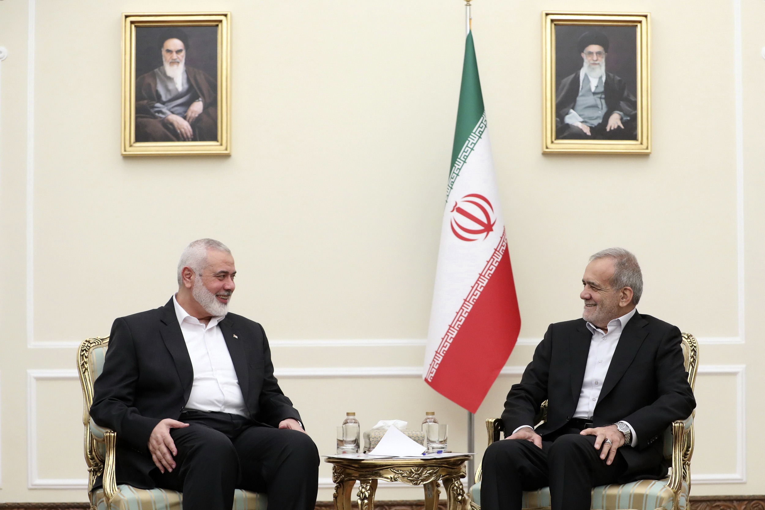 President Masoud Pezeshkian (right) meets Hamas chief Ismail Haniyeh at the President's office in Tehran, Iran on July 30.