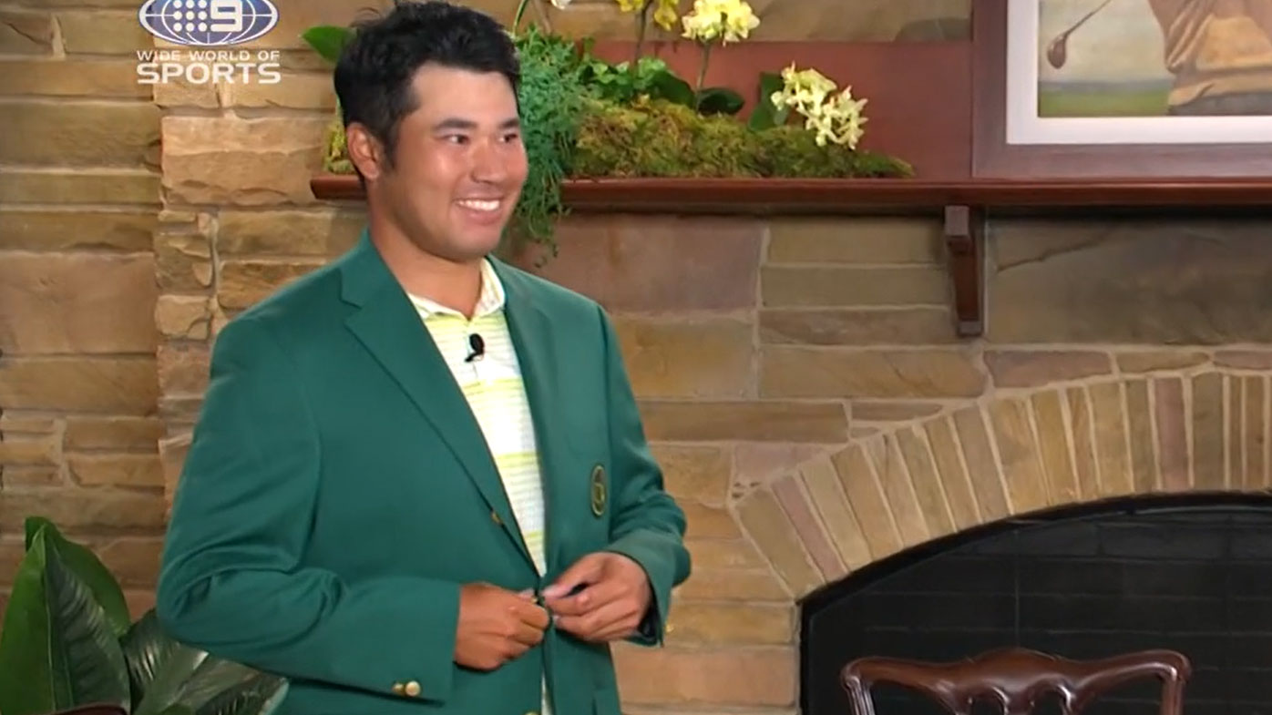 Matsuyama receives his green jacket. (Nine)