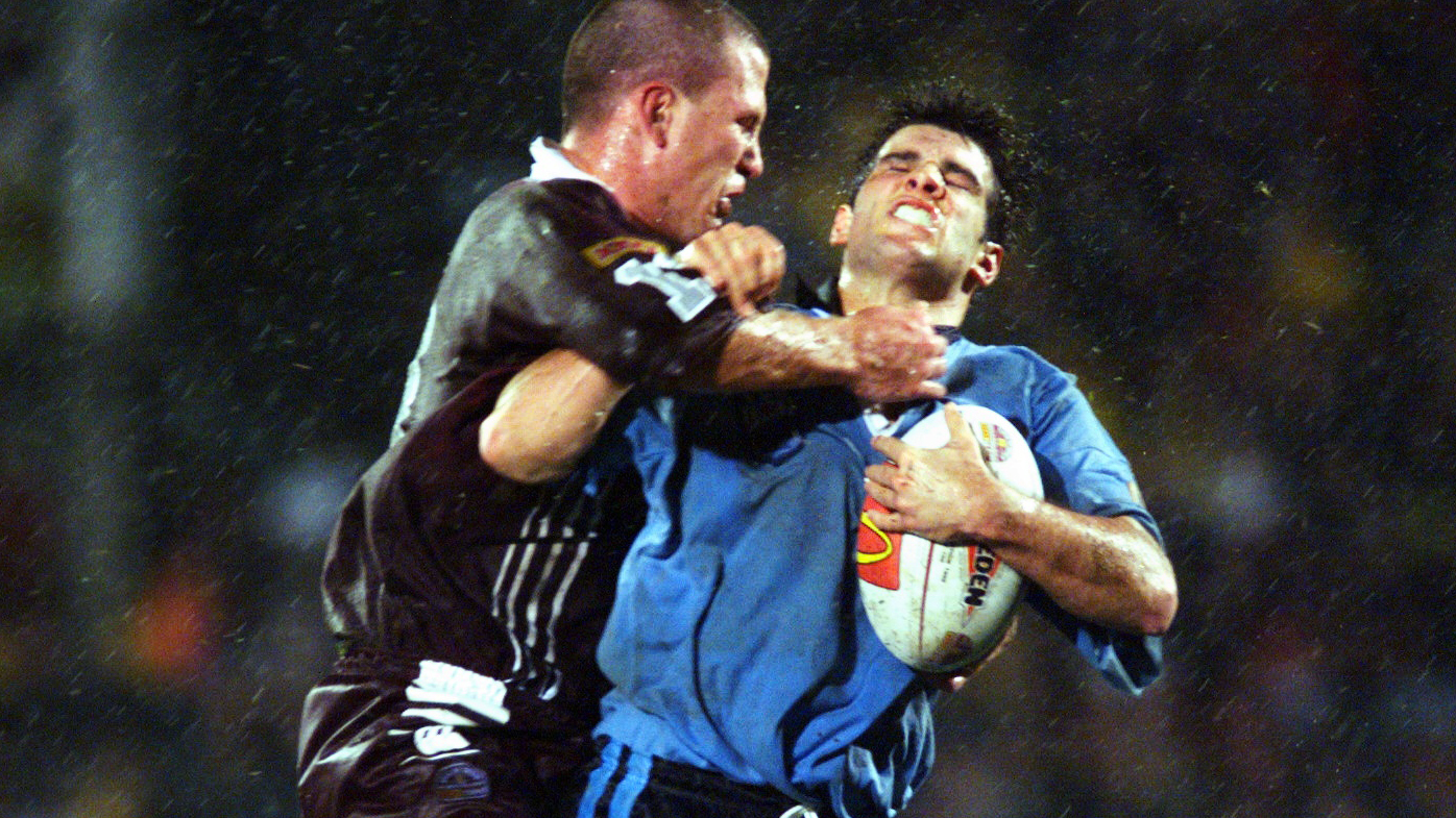 Ryan Girdler is tackled by Jason Smith in the 1999 State of Origin series