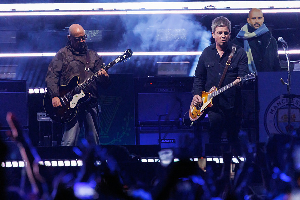 Paul Benjamin "Bonehead" Arthurs, Noel Gallagher of Oasis perform onstage at the Oasis Live '25 World Tour held at the Rose Bowl on September 07, 2025 in Pasadena, California. (Photo by Rich Polk/Variety via Getty Images)