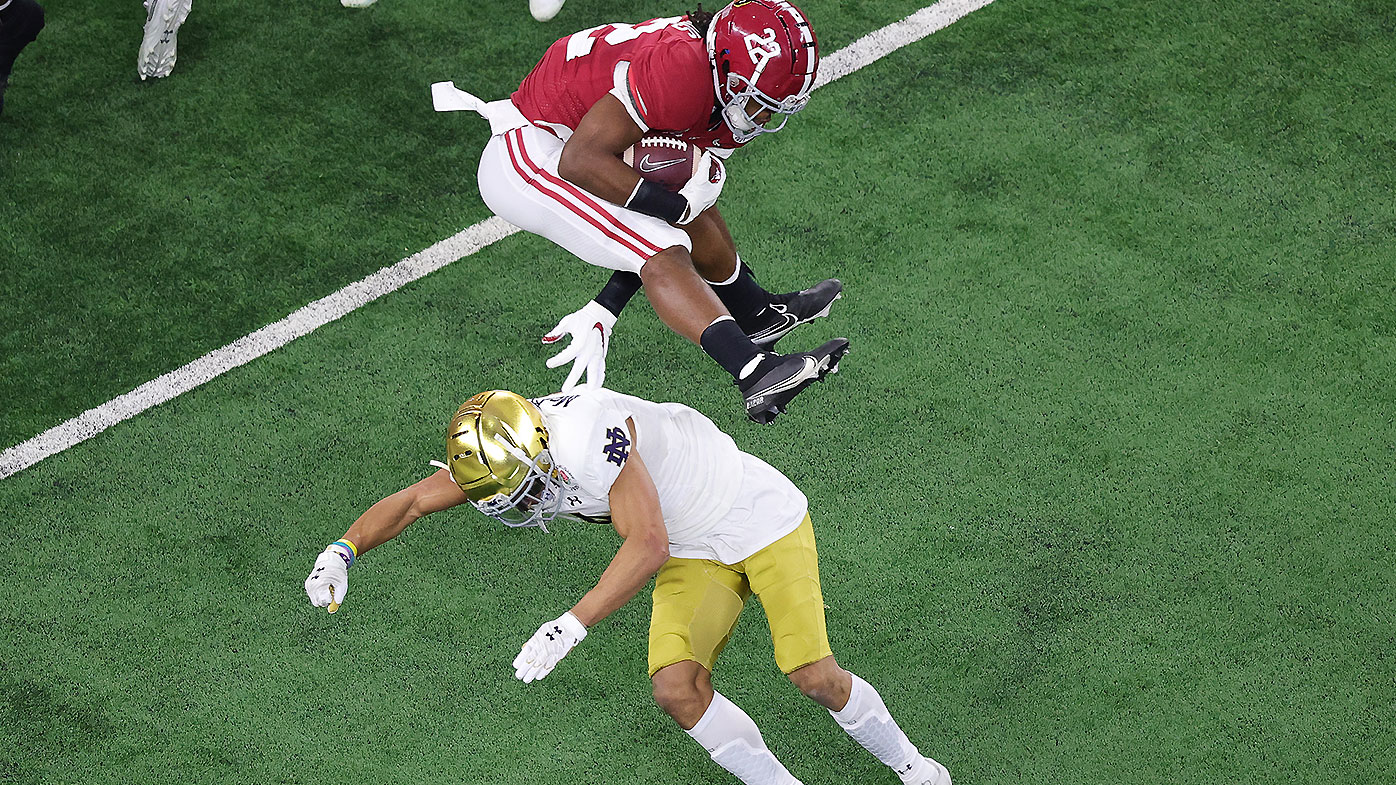 Najee Harris hurdles Notre Dame star as Alabama wins Rose ...