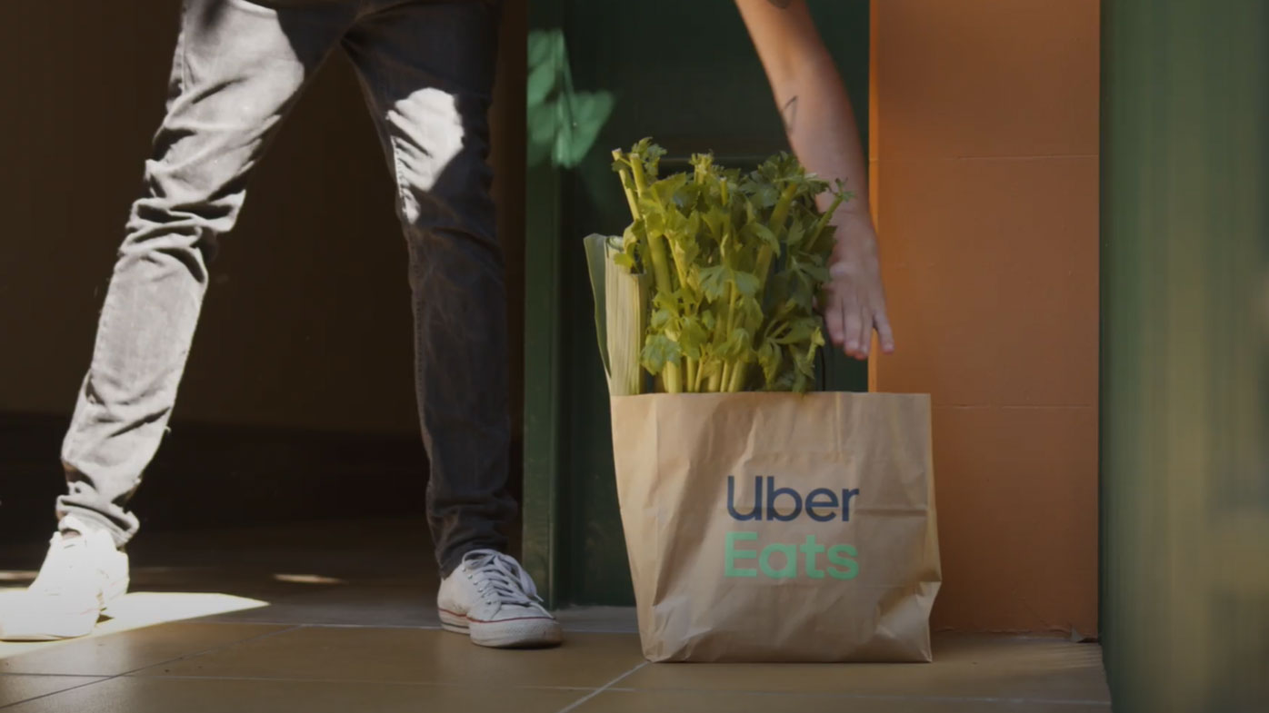 The order is packed at a Woolworths Metro store and then delivered by an Uber Eats driver or rider.