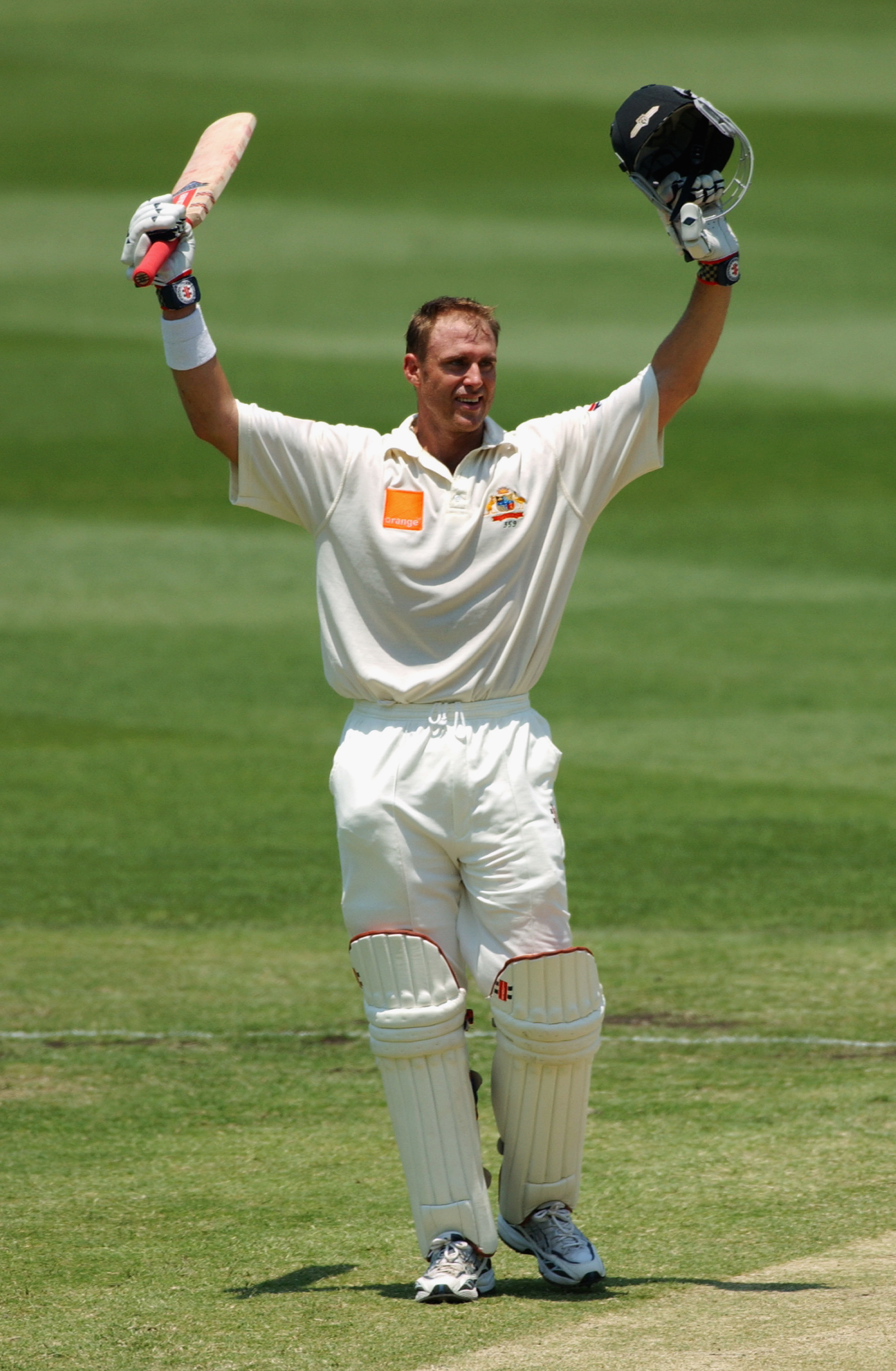 BRISBANE - NOVEMBER 10: Matthew Hayden of Australia celebrates scoring a century against England during day four of the First Ashes Test played between Australia and England held at the Gabba in Brisbane, Australia on November 10, 2002. (Photo by Darren England/Getty Images)