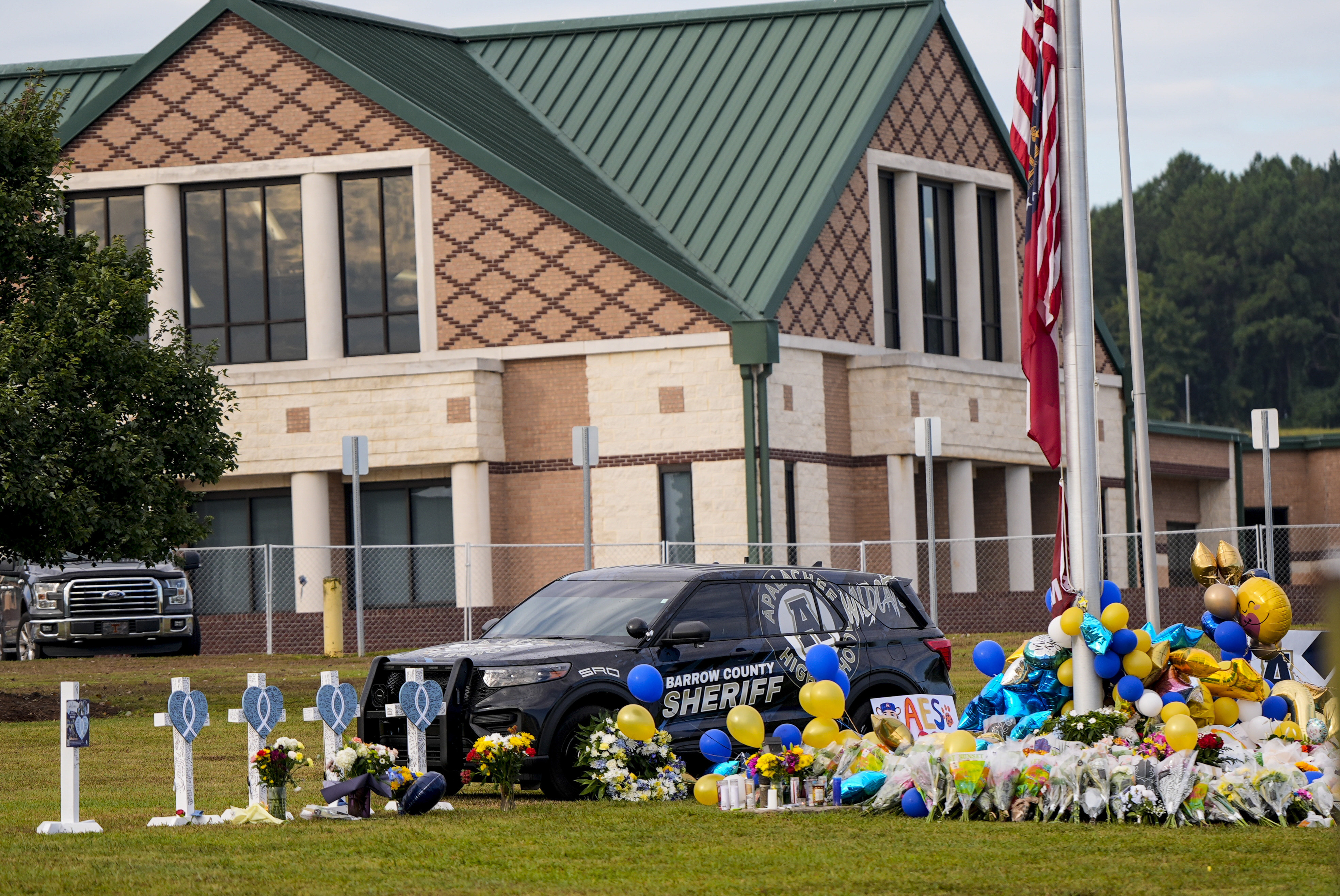 A memorial is seen at Apalachee High School after the school shooting.