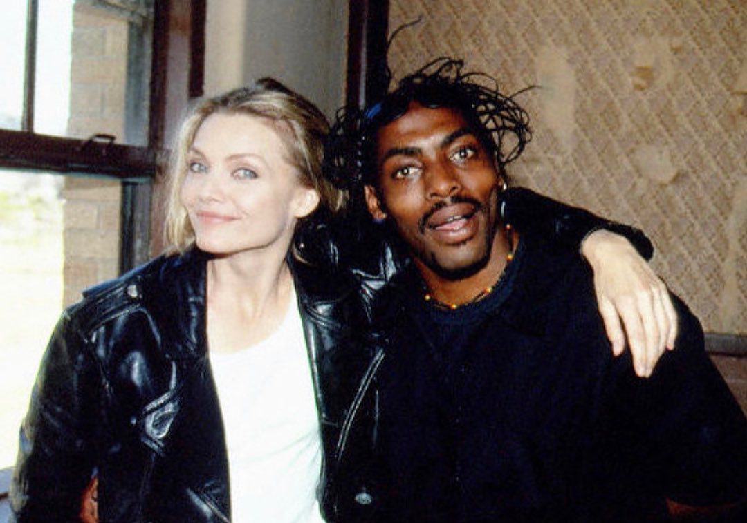 Michelle Pfeiffer shares throwback photo of her and rapper Coolio behind the scenes of the music video for his hit song Gangsta's Paradise.