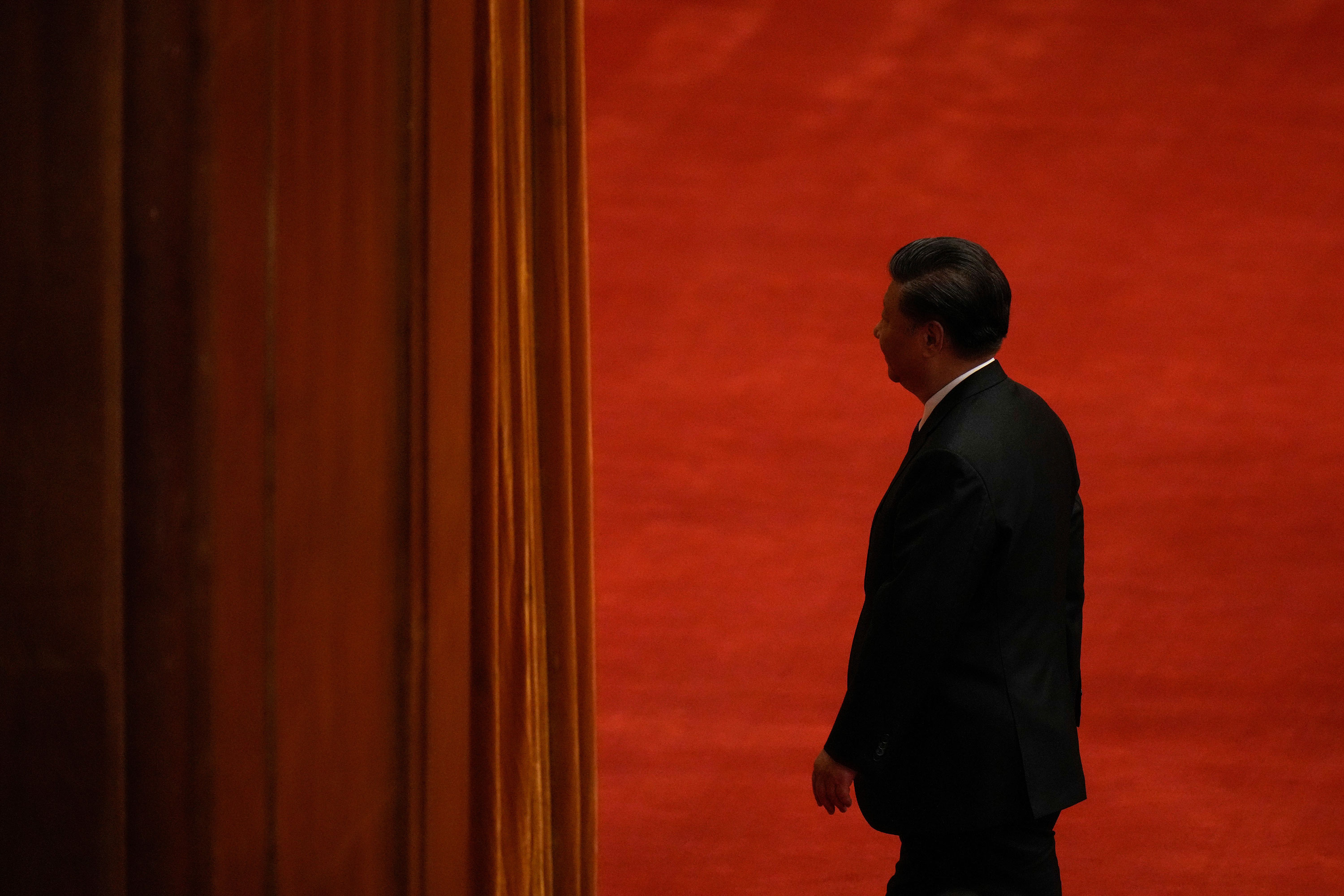 Chinese President Xi Jinping leaves after delivering a speech at an event commemorating the 110th anniversary of Xinhai Revolution at the Great Hall of the People in Beijing. (AP 