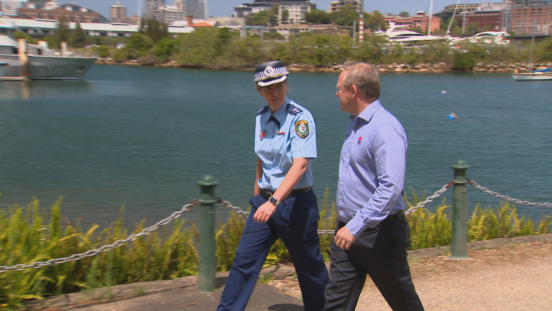 NSW Maritime Acting Executive Director, Darren Wood and Acting Superintendent Siobhan Munro, Marine Area Command walking along the water of Balmain