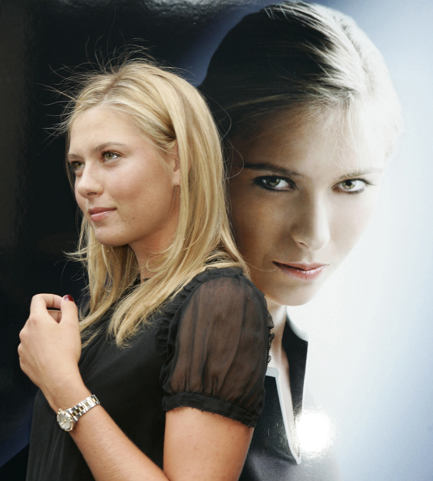 Maria Sharapova poses with her new TAG Heuer watch outside Bloomingdale's in New York in 2006.