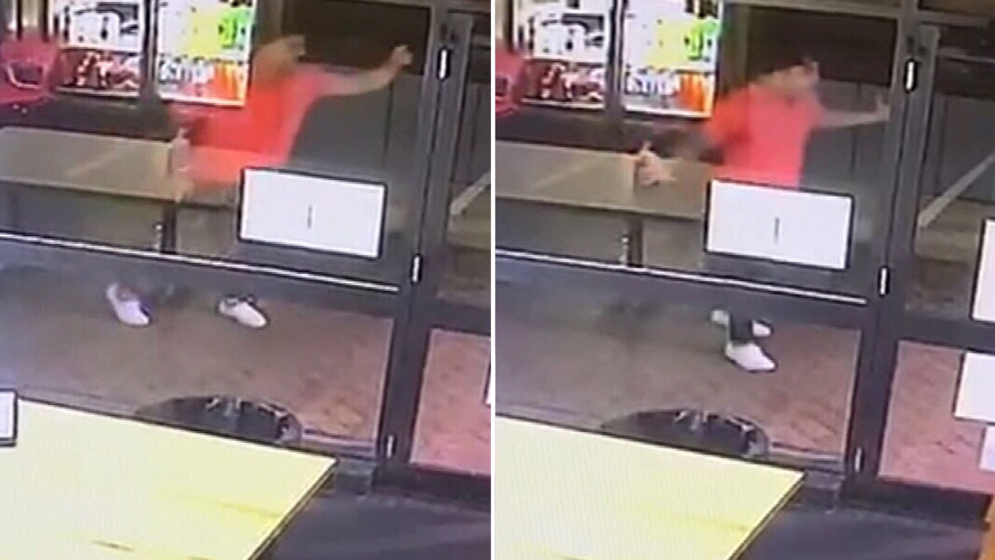 Dylan Walker seen on CCTV outside the restaurant on the night of the assault.