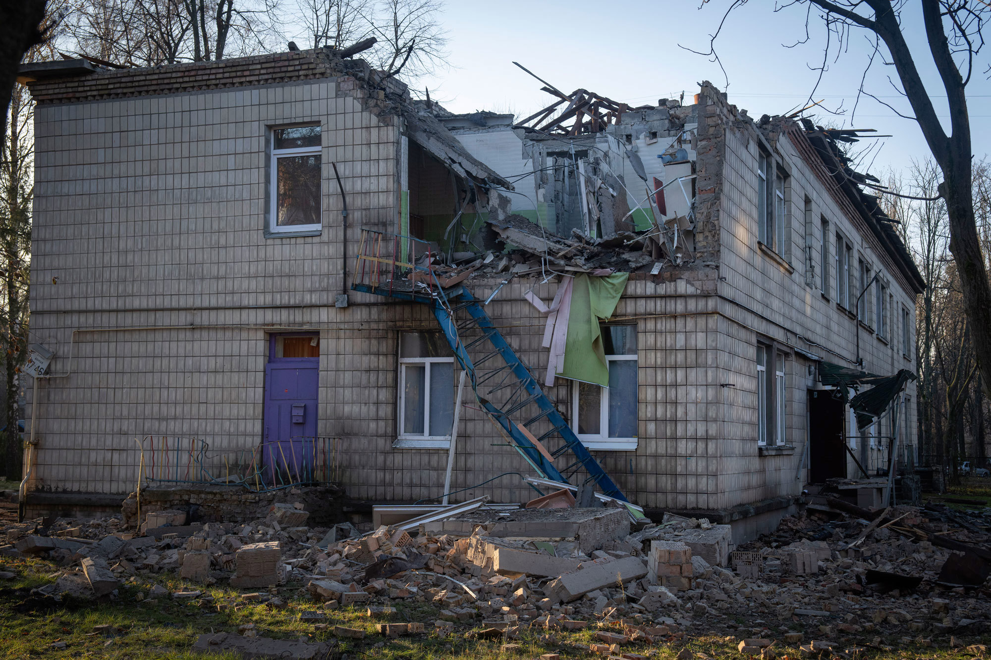 A damaged kindergarten following a Russian drone attack in Kyiv, Ukraine, Saturday, Nov. 25, 2023.