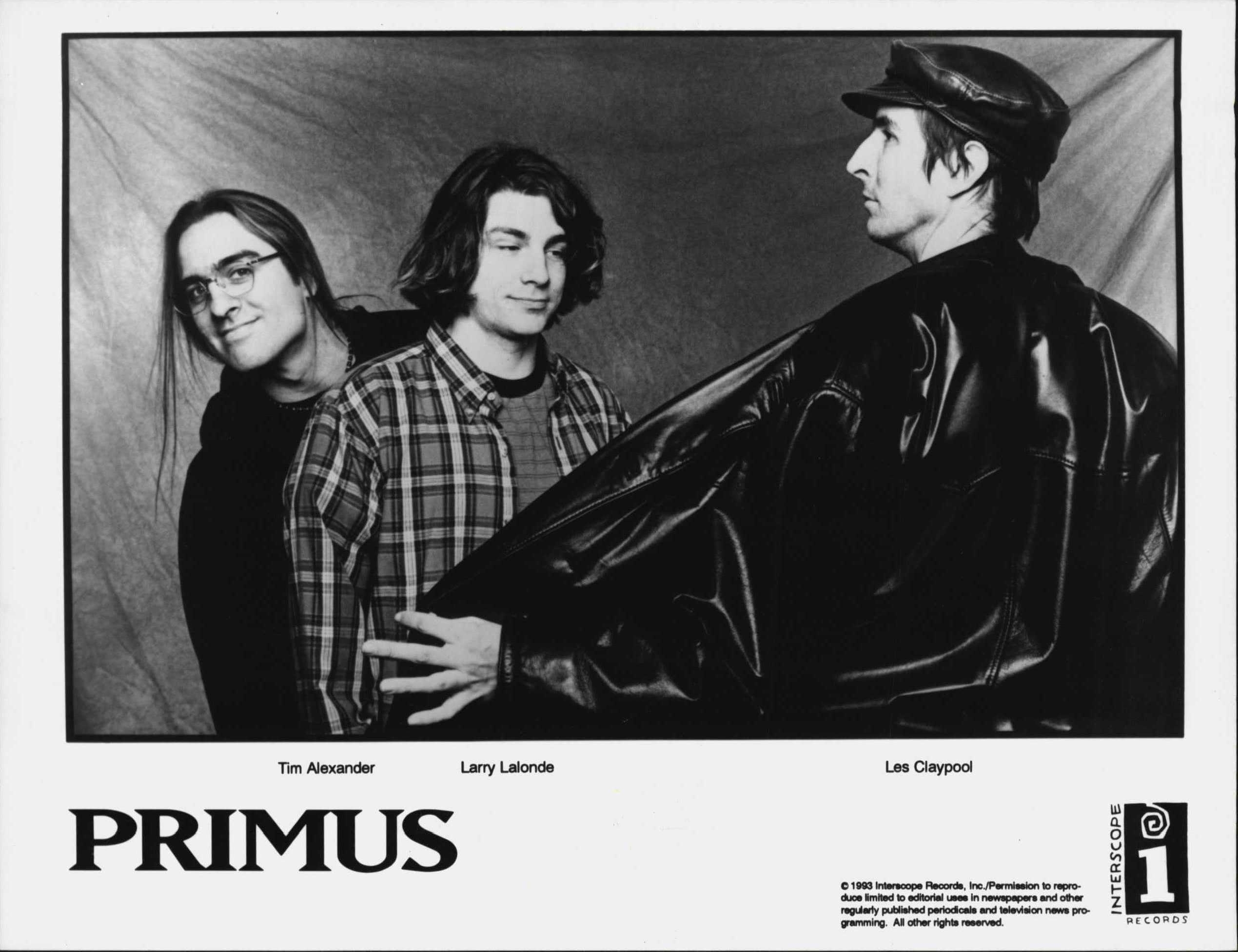 Primus: Tim Alexander, Larry Lalonde, Les Claypool. January 1, 1994. (Photo by Interscope Records).