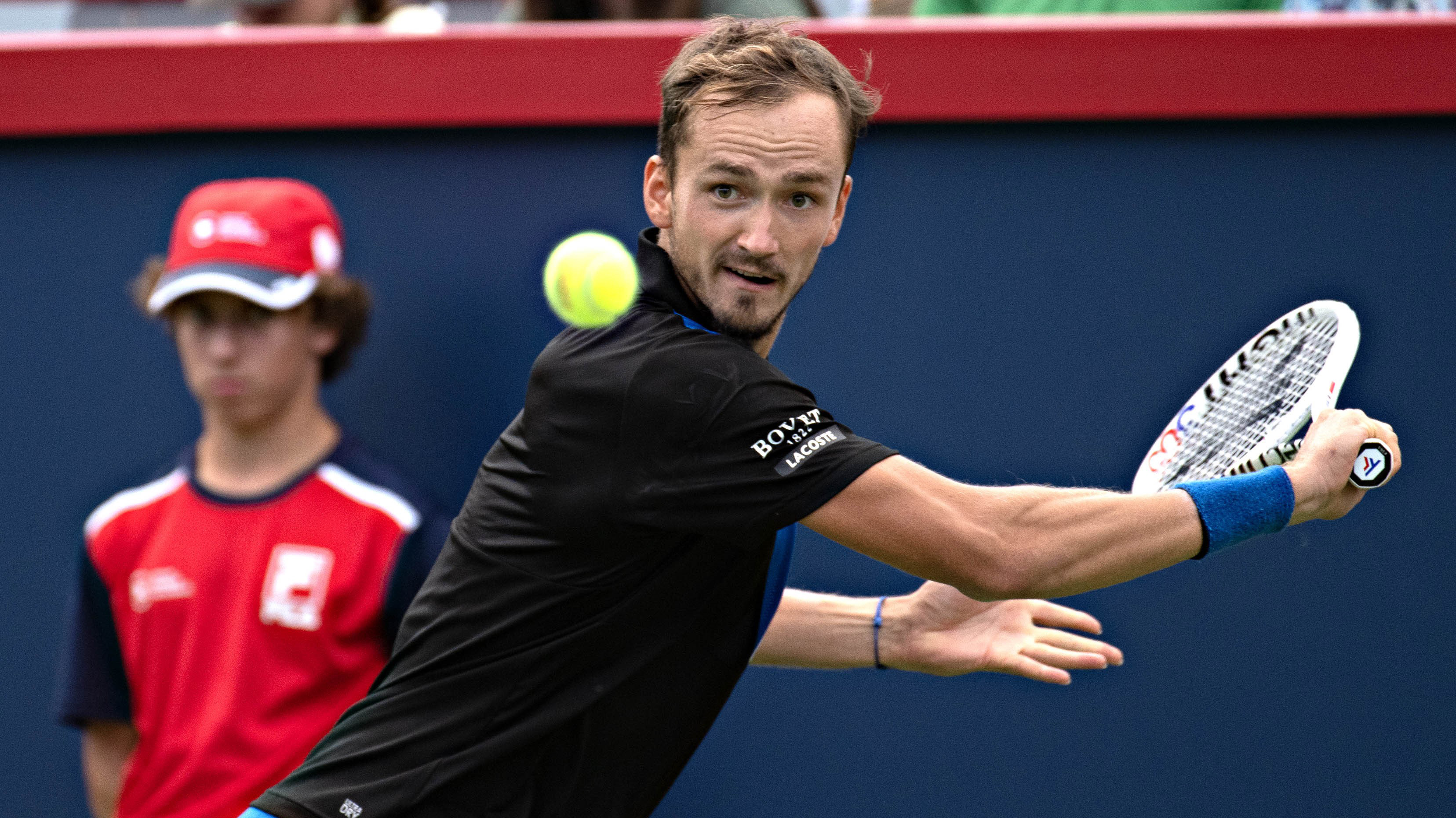 Daniil Medvedev competes during the men's singles second round match between Daniil Medvedev of Russia and Nick Kyrgios of Australia at the 2022 National Bank Open tennis tournament at the IGA Stadium in Montreal, Canada, on Aug. 10, 2022. (Photo by Andrew Soong/Xinhua via Getty Images)