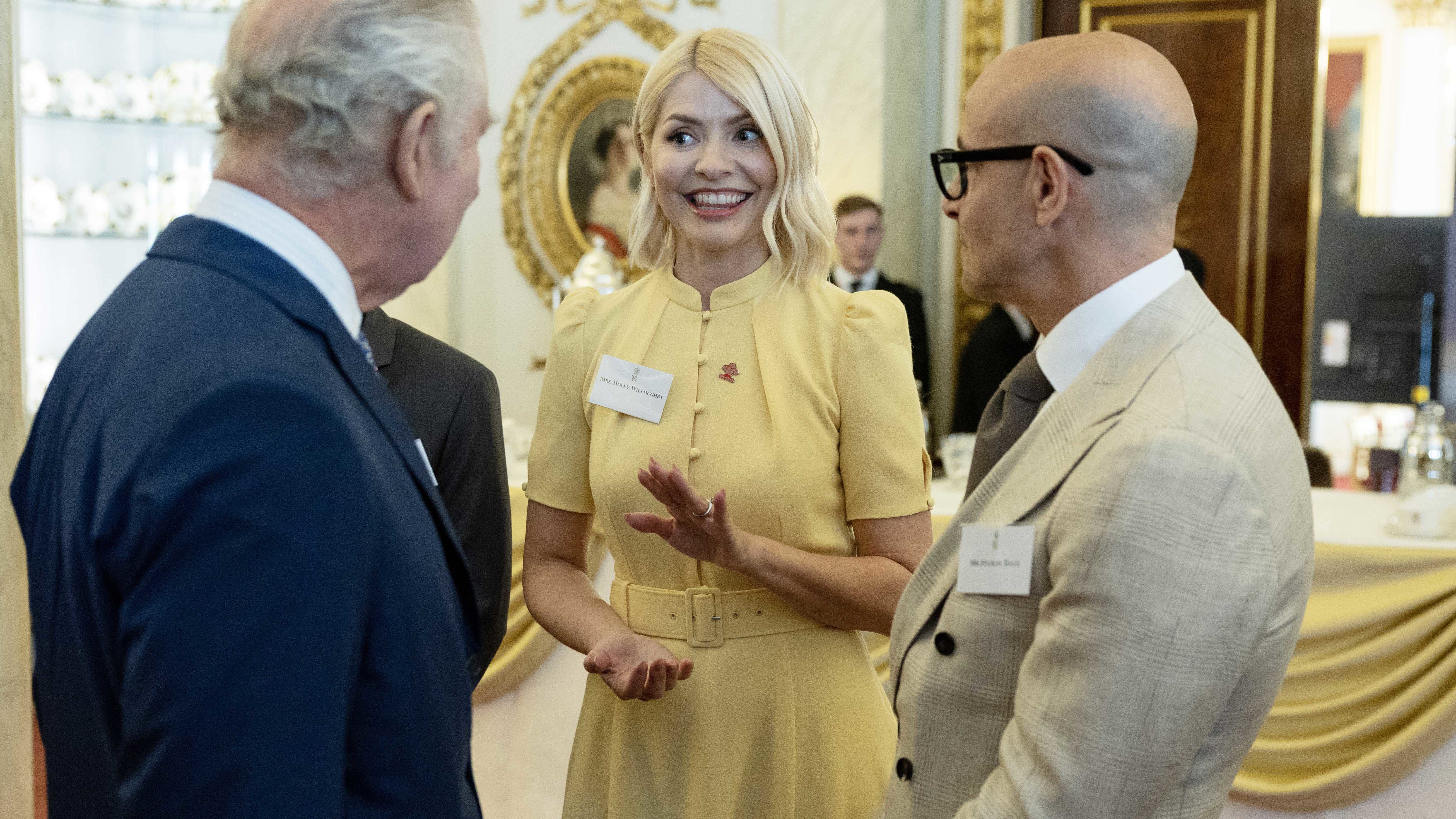 Holly Willoughby pictured with King Charles III at Buckingham Palace in May 2023.