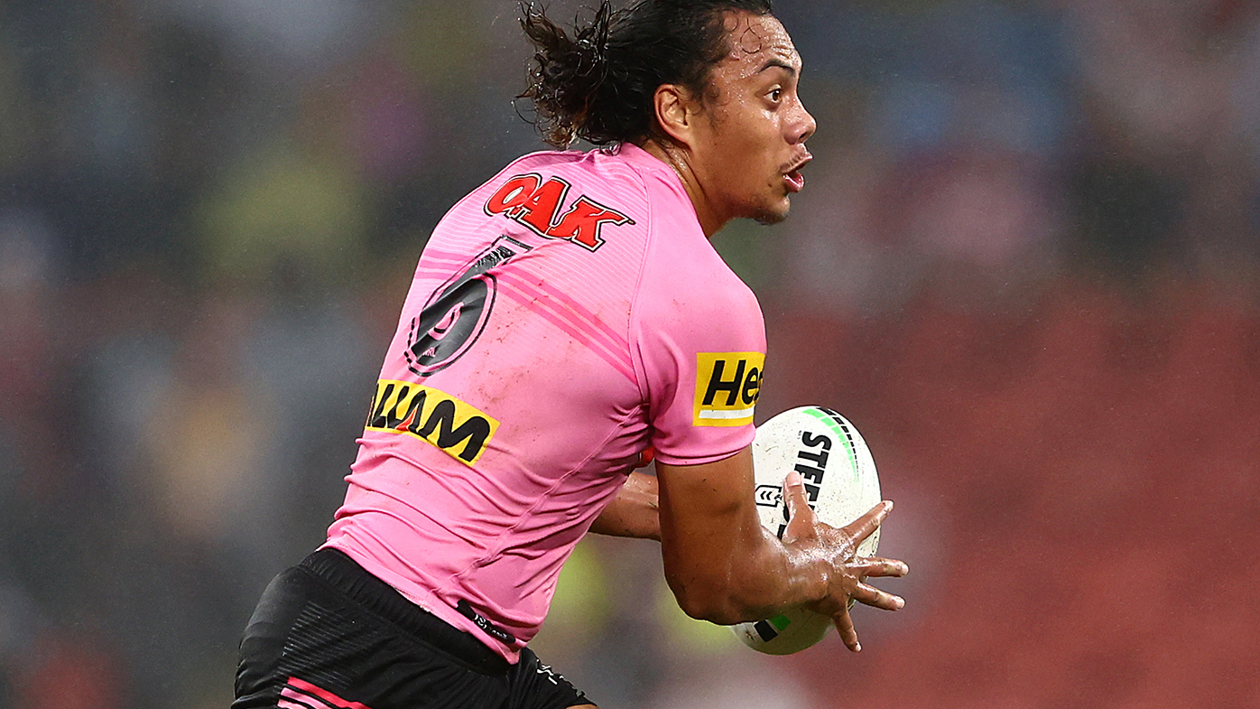 Jarome Luai runs the ball against Melbourne.