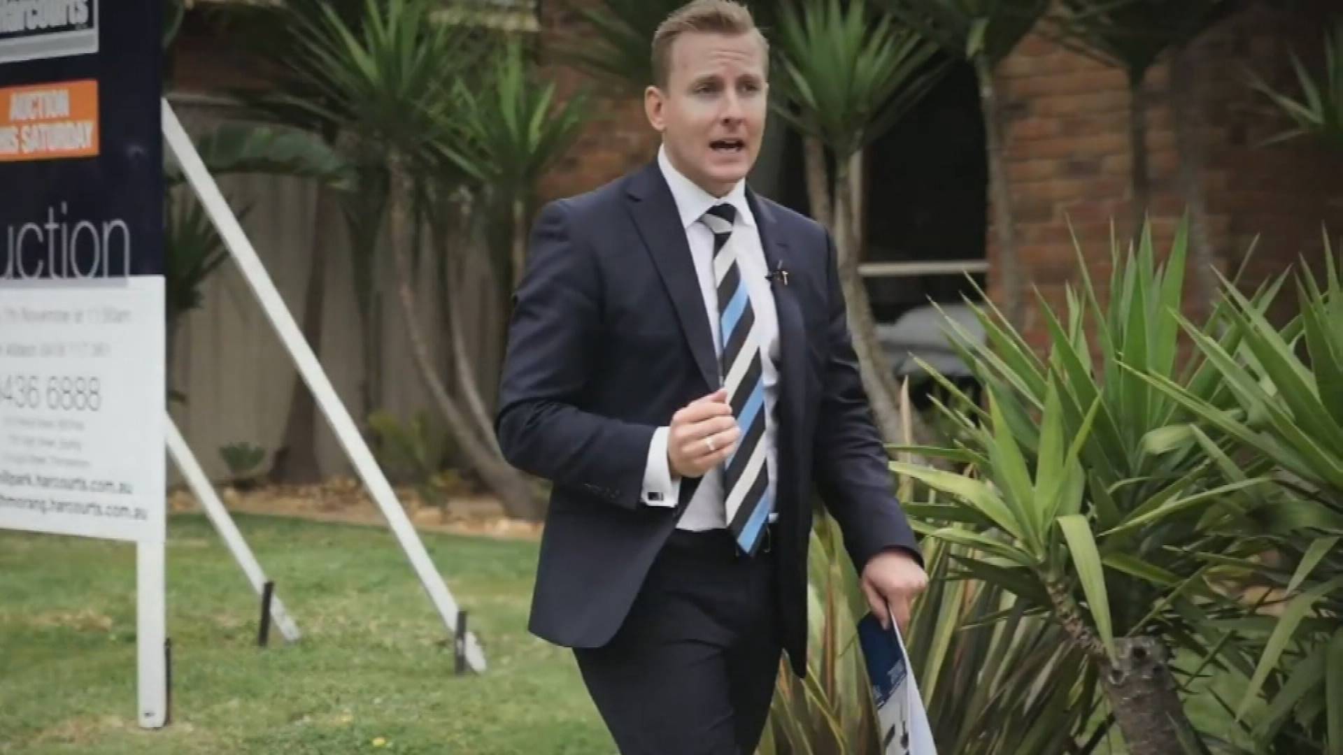 A Port Melbourne real estate agent has been jailed for secretly filming young women inside their homes.