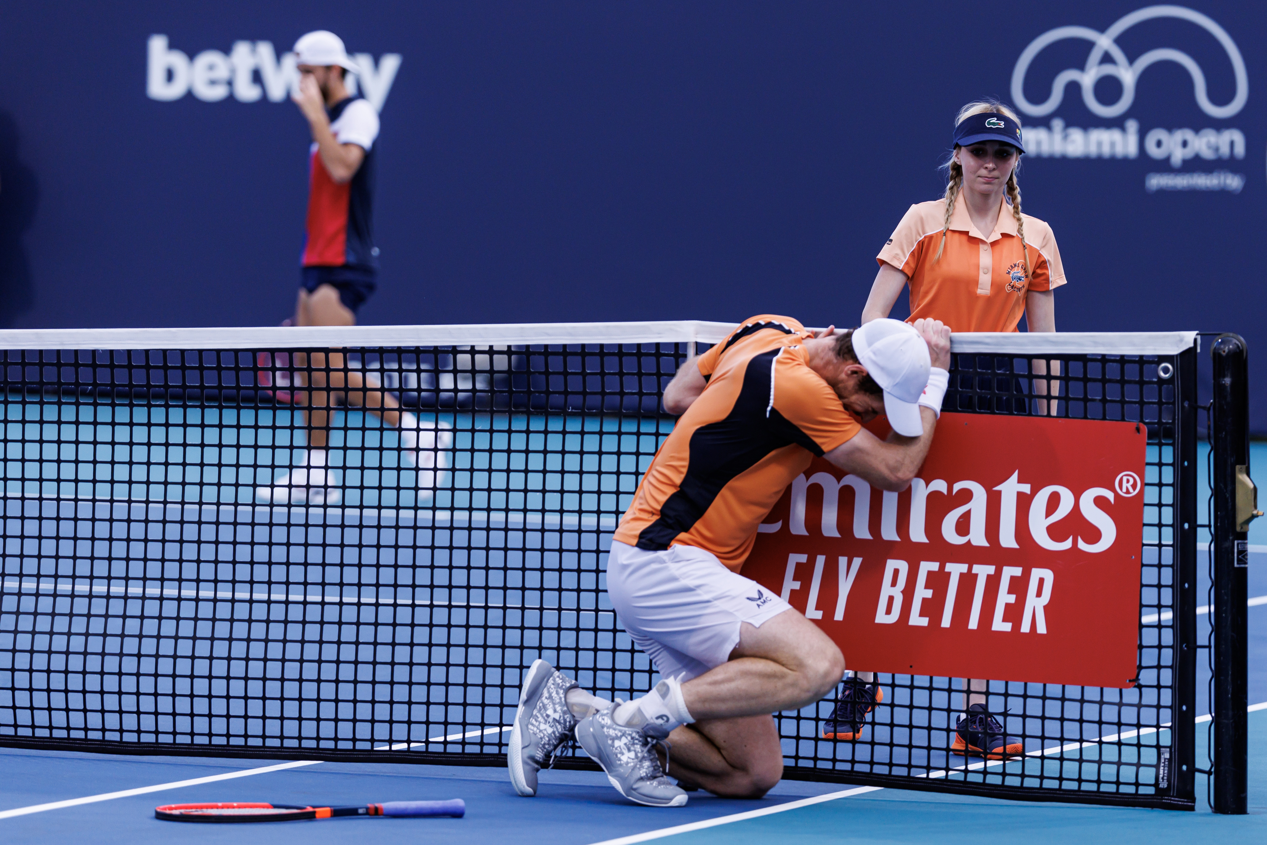 Andy Murray collapses in pain at the Miami Open after rolling his ankle.